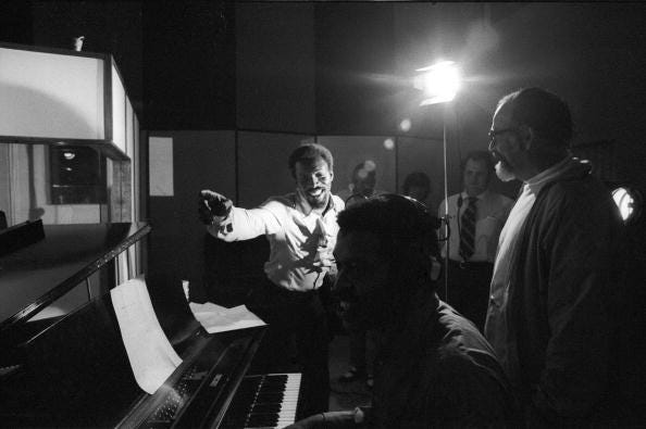 R&B and soul singer Wilson Pickett, left, and producer Jerry Wexler, right, chat while recording at the Muscle Shoals Sound Studio on Nov. 24, 1969, in Sheffield, Alabama.