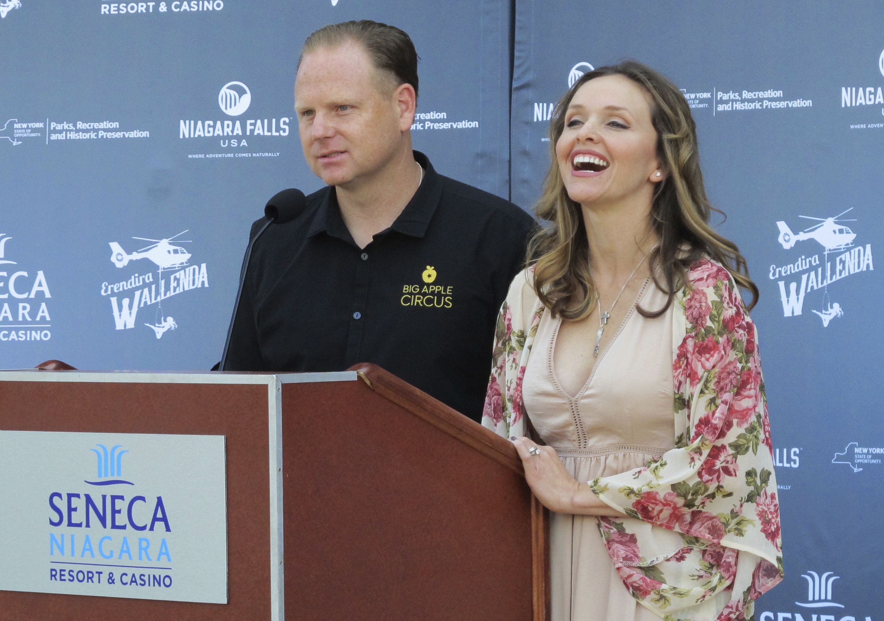 Nik Wallenda's wife hangs by her teeth from helicopter over Niagara Falls