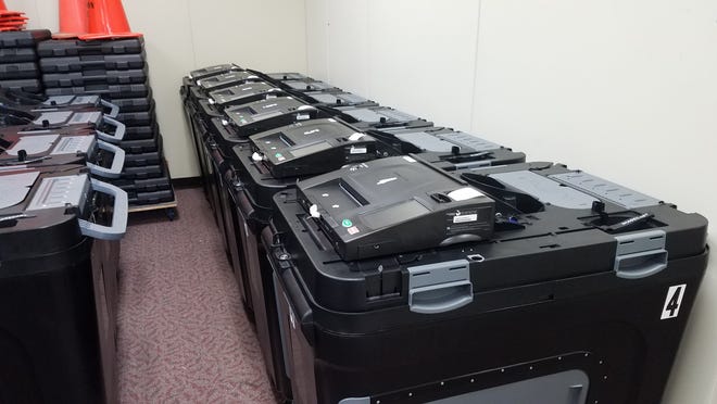 Several of the new election tabulators are lined up in the city clerk's office of Port Huron's Municipal Office Center.