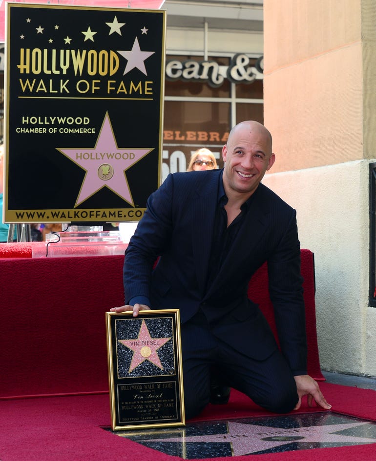 Vin Diesel poses with his 'Star' ceremony on the Hollywood Walk of Fame in 2013. The actor received the 2,504th Star on the Hollywood Walk of Fame in the Category of Motion Pictures.