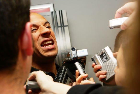 Vin Diesel talks to media, as he arrives to the New York premiere of his film "Find Me Guilty" in 2006.