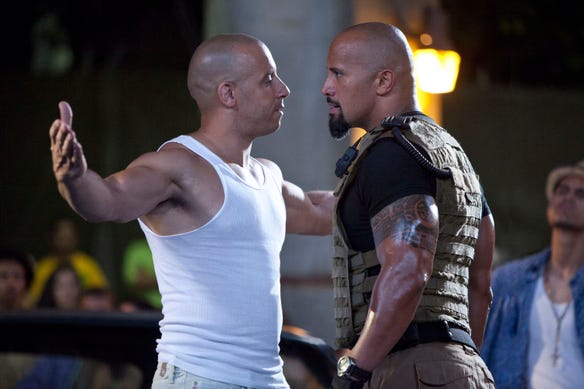 Beef back then? Vin Diesel and Dwayne Johnson are shown in a scene from "Fast Five." Ironically, it's rumored that there was real tension between the two stars on set in "The Fate of the Furious" in 2017!