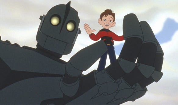 The Iron Giant (voiced by Vin Diesel) and Hogarth Hughes (voiced by Eli Marienthal) star in the "The Iron Giant," the story of a young boy who befriends an alien robot.