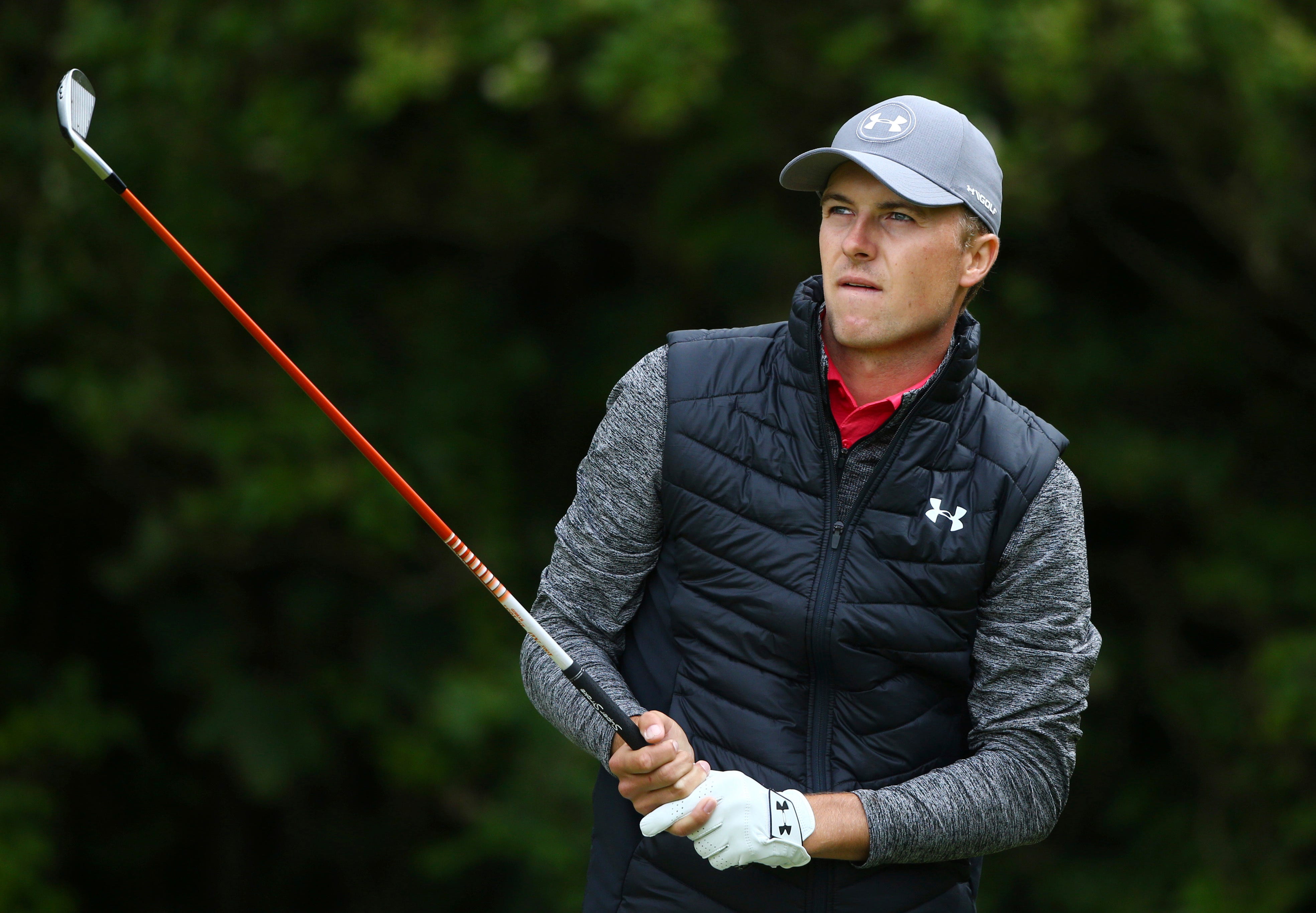 The Latest: Spieth shoots 65 to take the early lead in Open