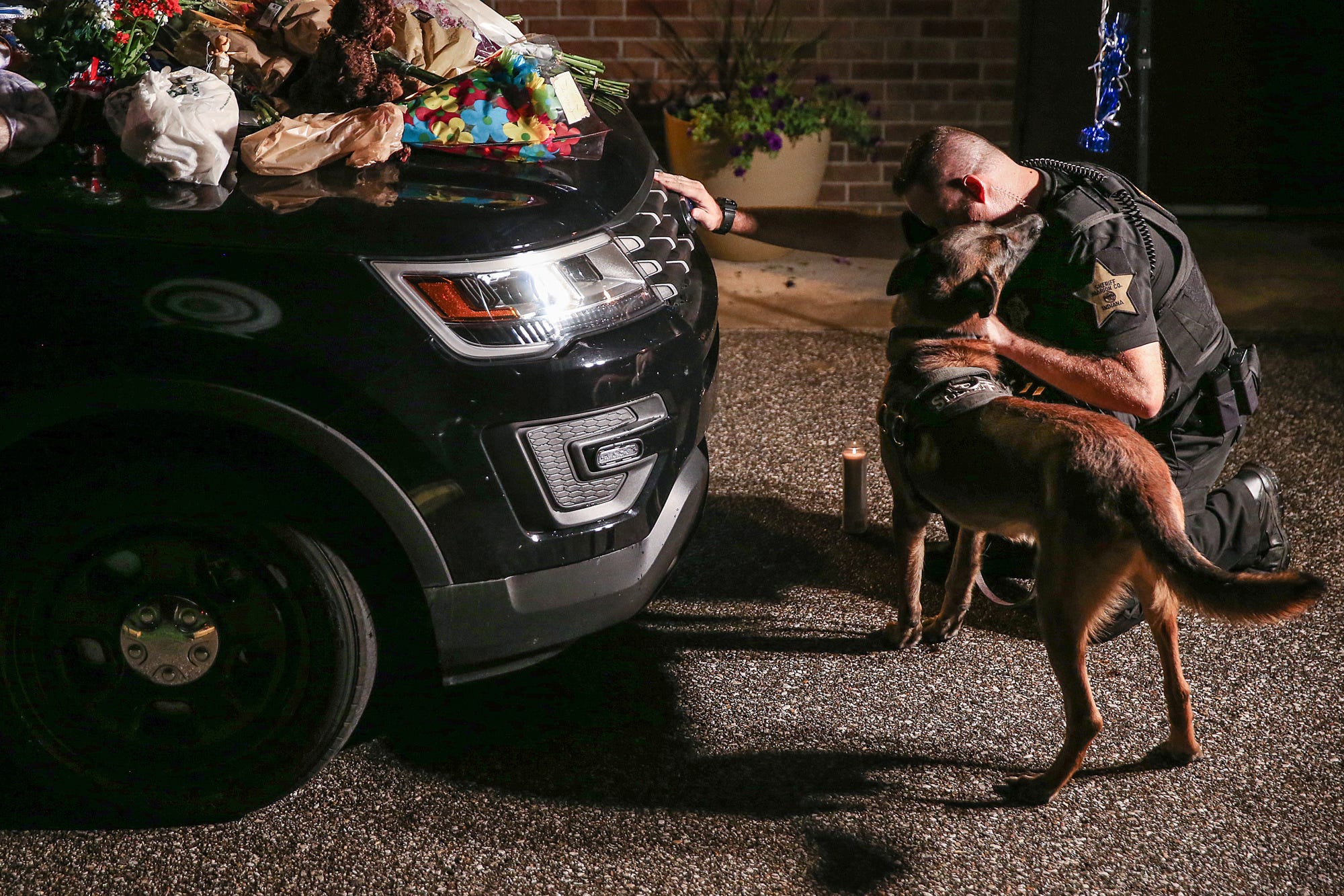'A big teddy bear': Southport community remembers slain officer Aaron Allan