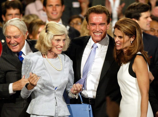 Eunice Kennedy Shriver, sister of former President John F. Kennedy, founded the Special Olympics. In this photo from 2003, Shriver is seen celebrating with her daughter, Maria Shriver, right, and her husband, Arnold Schwarzenegger, then governor of California.