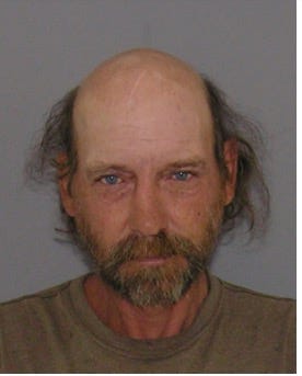 Homeless man charged with raping a woman in his encampment