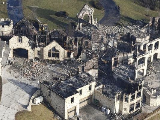 Indian Hill mansion fire, still a mystery, heads to court with millions on the line