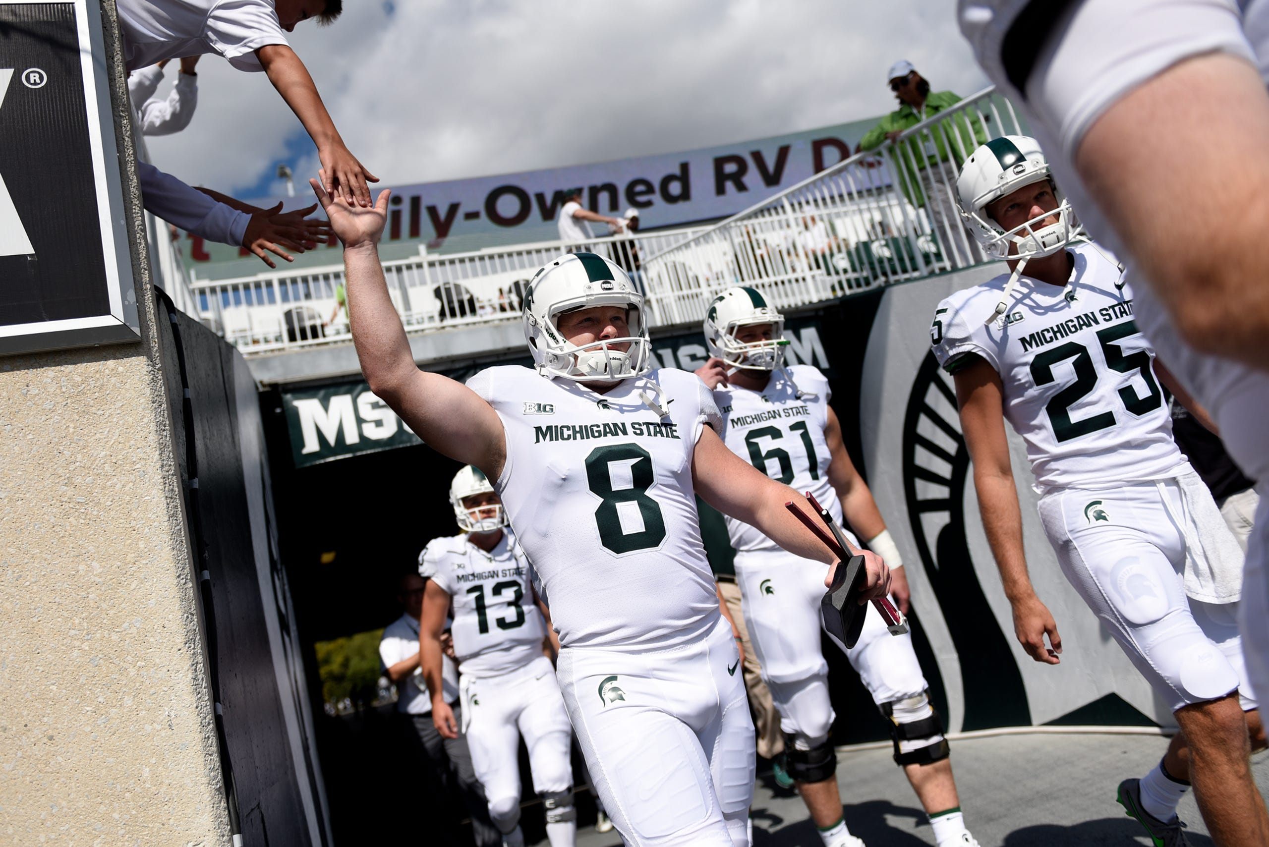 Spartans Wearing All White Uniforms