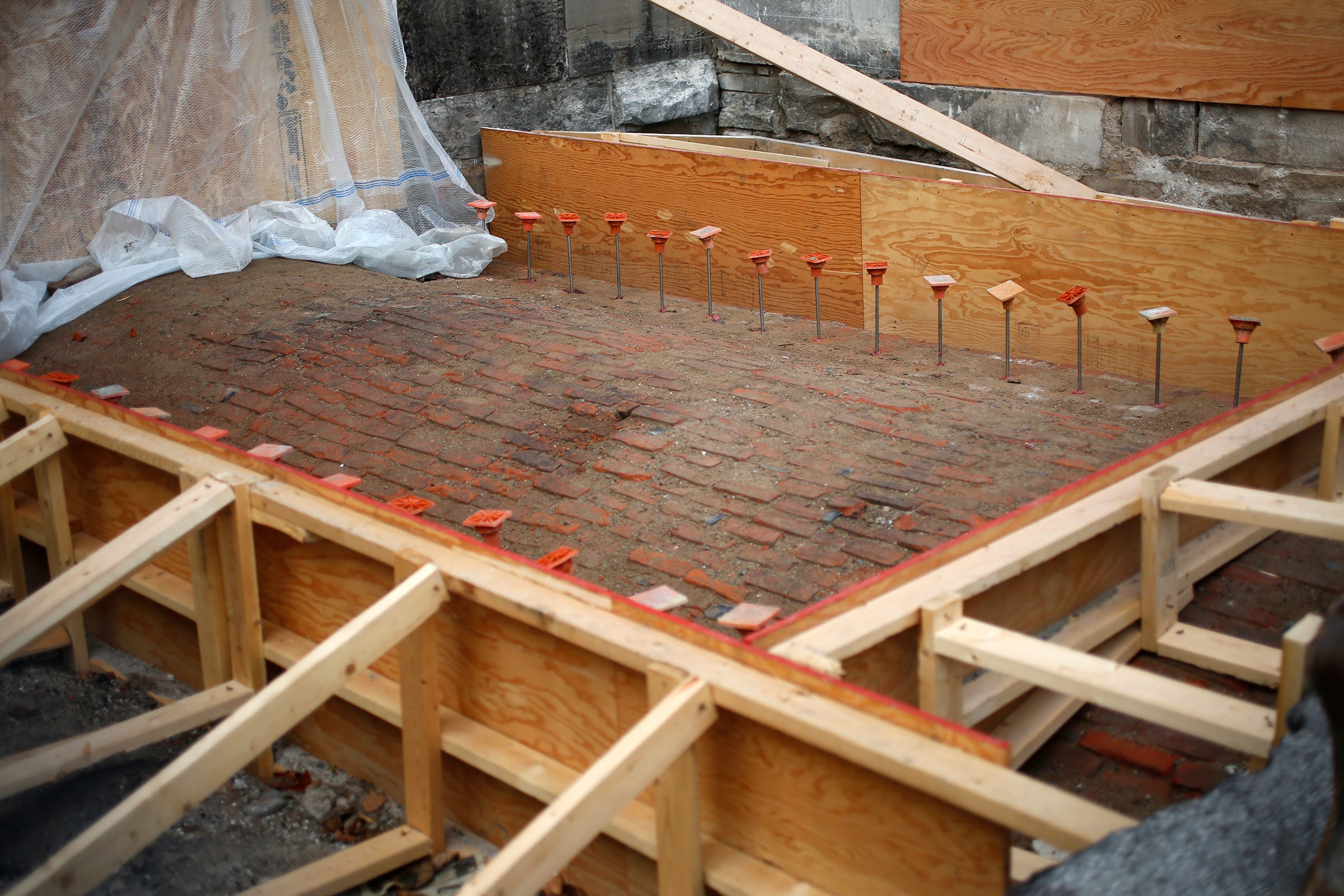 History exposed: Brick arch to the Statehouse stables revealed