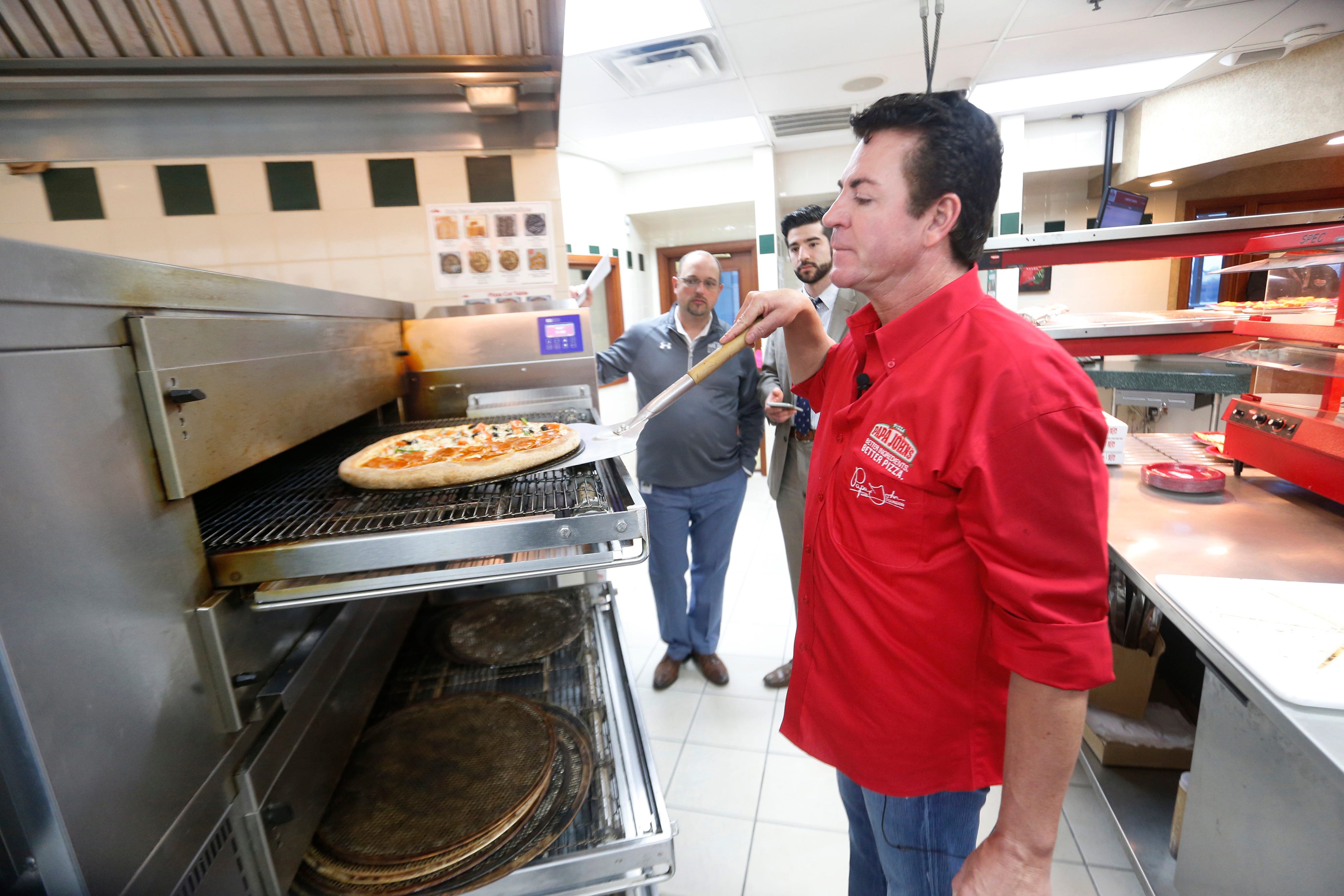 Papa John blames NFL protests for sales woes