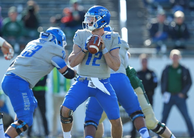 MTSU quarterback Brent Stockstill looks downfield during a game against Charlotte at Jerry Richardson Stadium on Nov. 11, 2017. Stockstill threw for 255 yards in MTSU's 35-21 win, becoming the program's all-time leader in passing yardage.