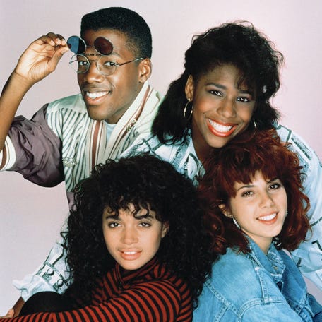 'A Different World' showed the world the warmth of college life at Hillman College, a historically black school. Pictured (clockwise from top left): Kadeem Hardison as Dwayne Cleophus Wayne, Dawnn Lewis as Jaleesa Vinson Taylor, Marisa Tomei as Maggie Lauten, Lisa Bonet as Denise Huxtable.