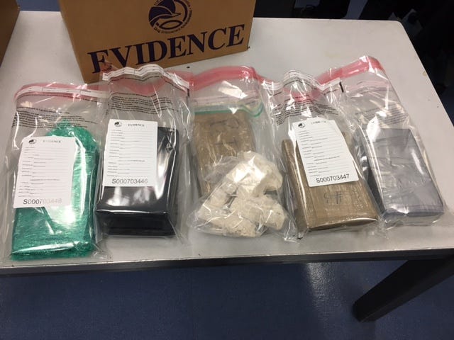 Suspect 'fought for hours': Heroin/fentanyl mix, $100K cash seized in bust