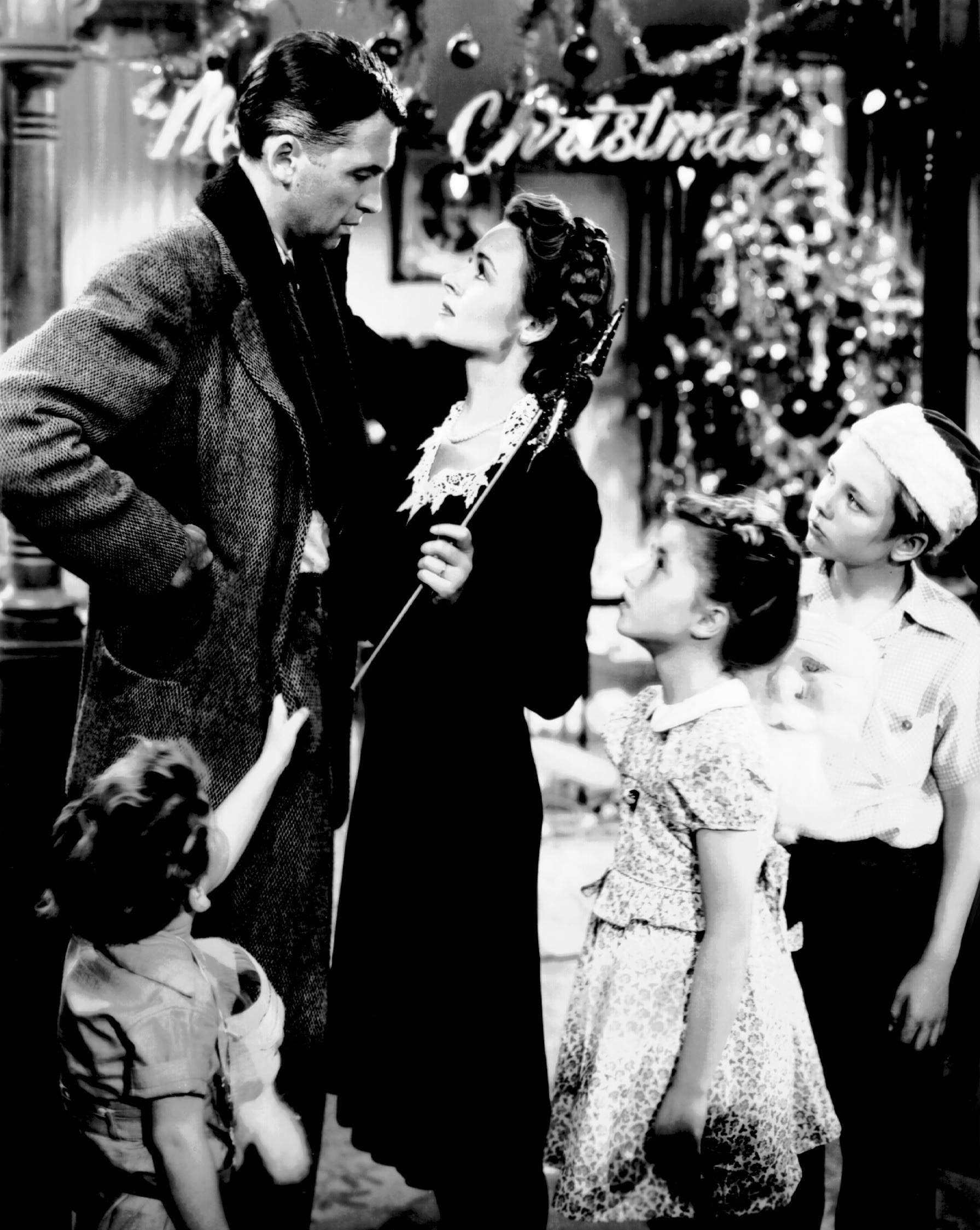 George (James Stewart, left) and Mary Bailey (Donna Reed, center) face a tumultuous Christmas Eve in "It's a Wonderful Life."