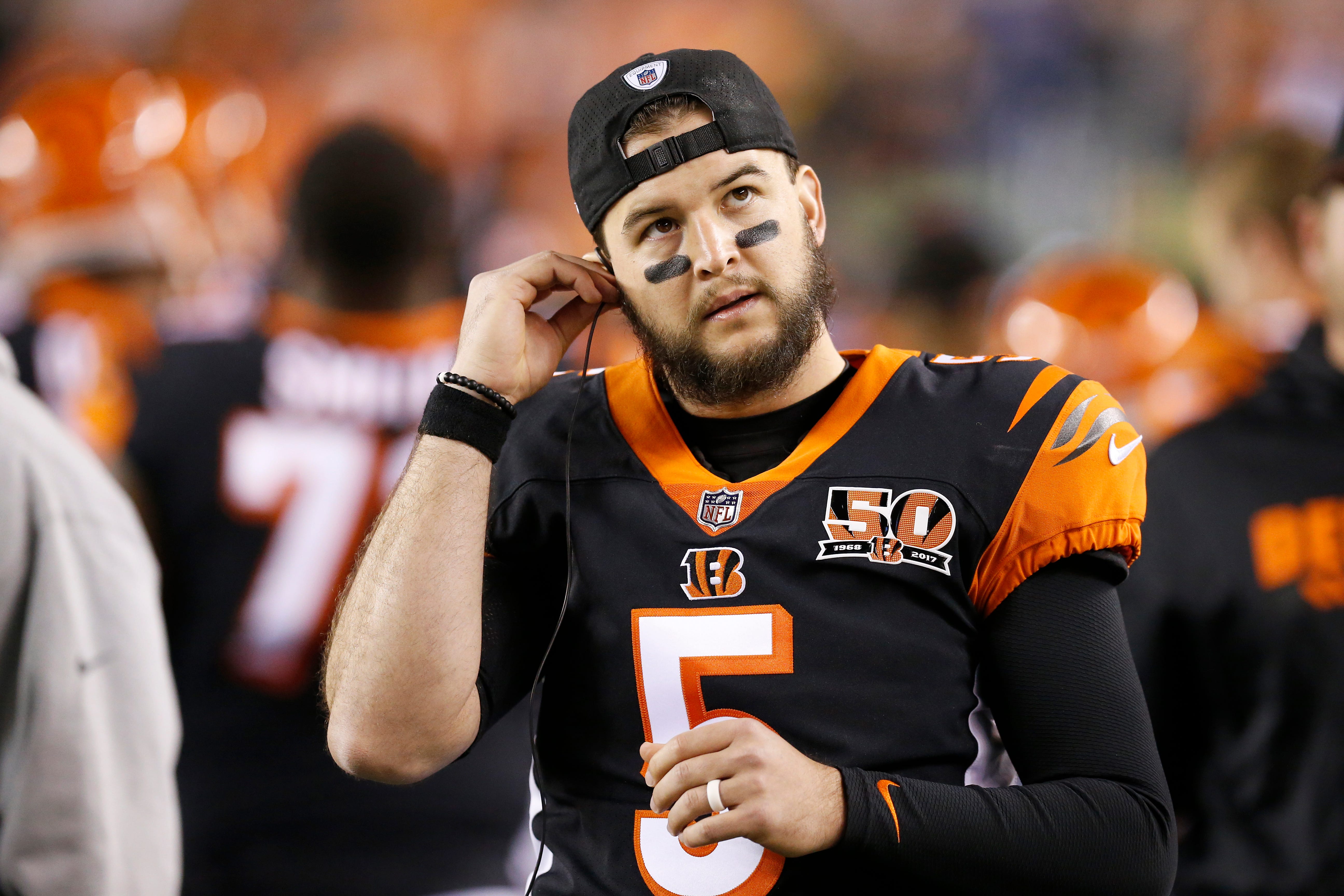 Which NFL teams might be considering AJ McCarron