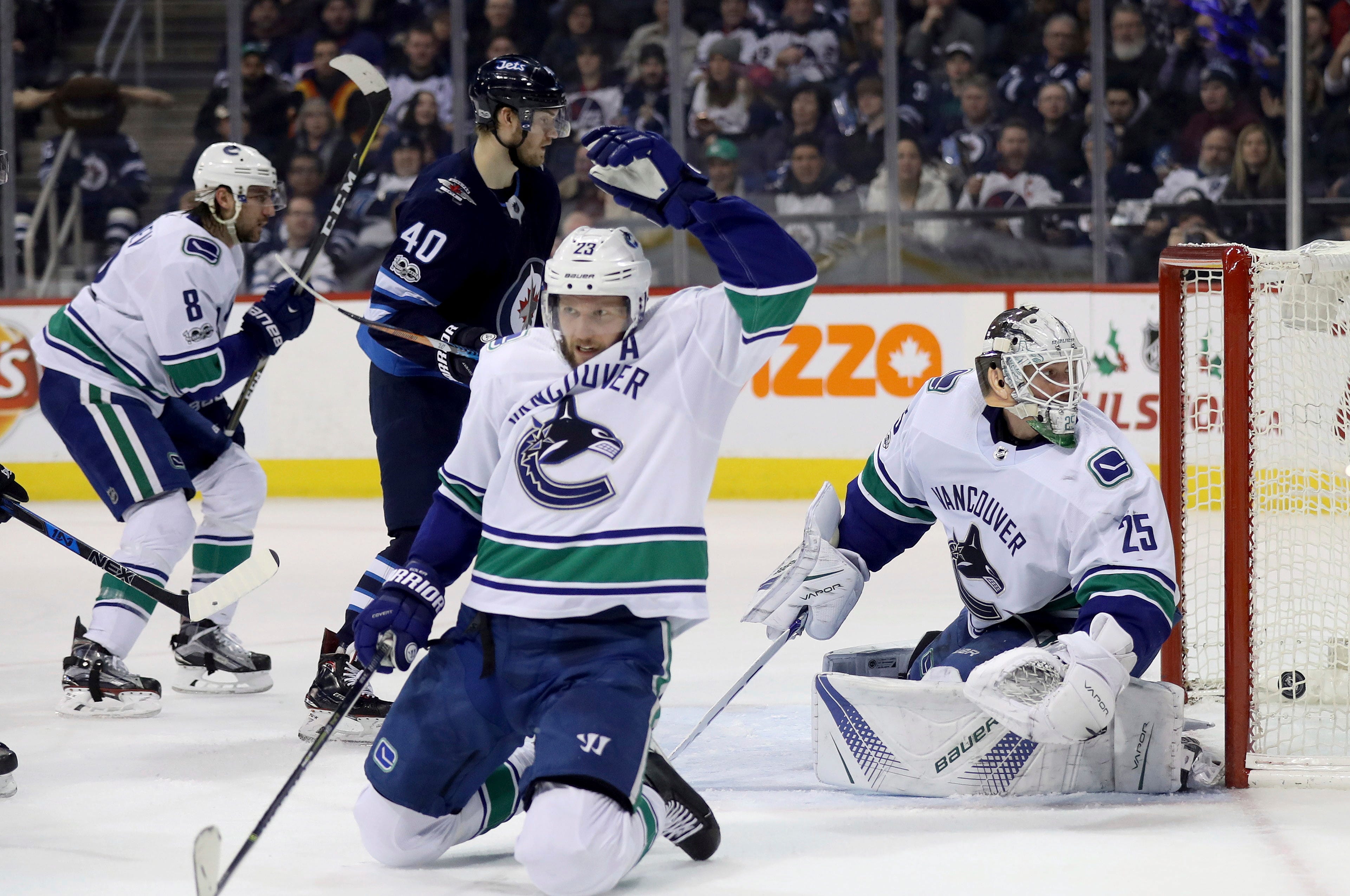 Perreault scores 2, Jets end skid with 5-1 win over Canucks