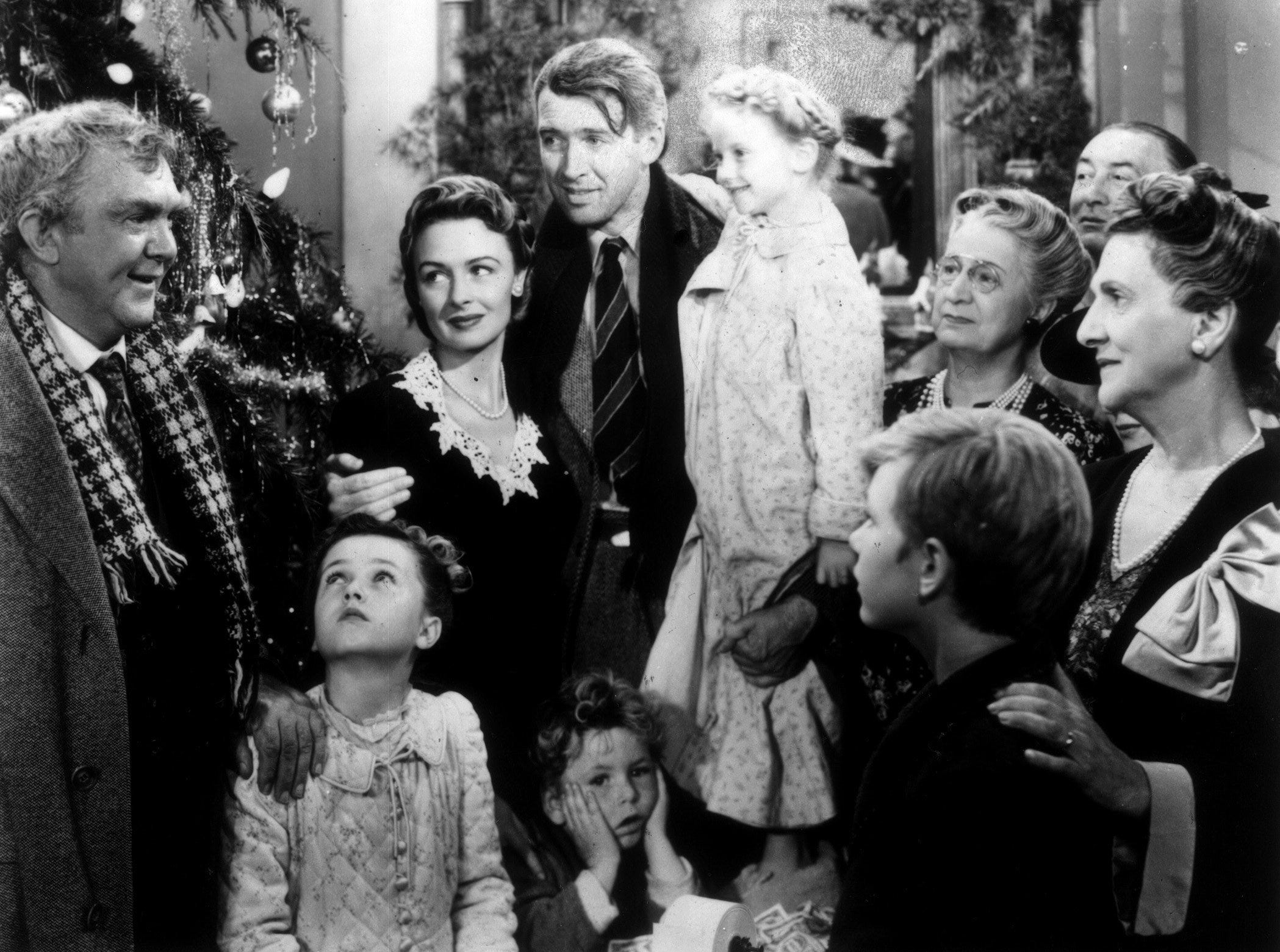 James Stewart (center) has a change of heart (with a little help) in "It's A Wonderful Life."