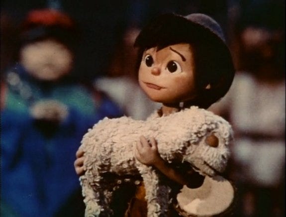 A child brings a gift to the newborn king in "The Little Drummer Boy," the animated 1968 TV special.