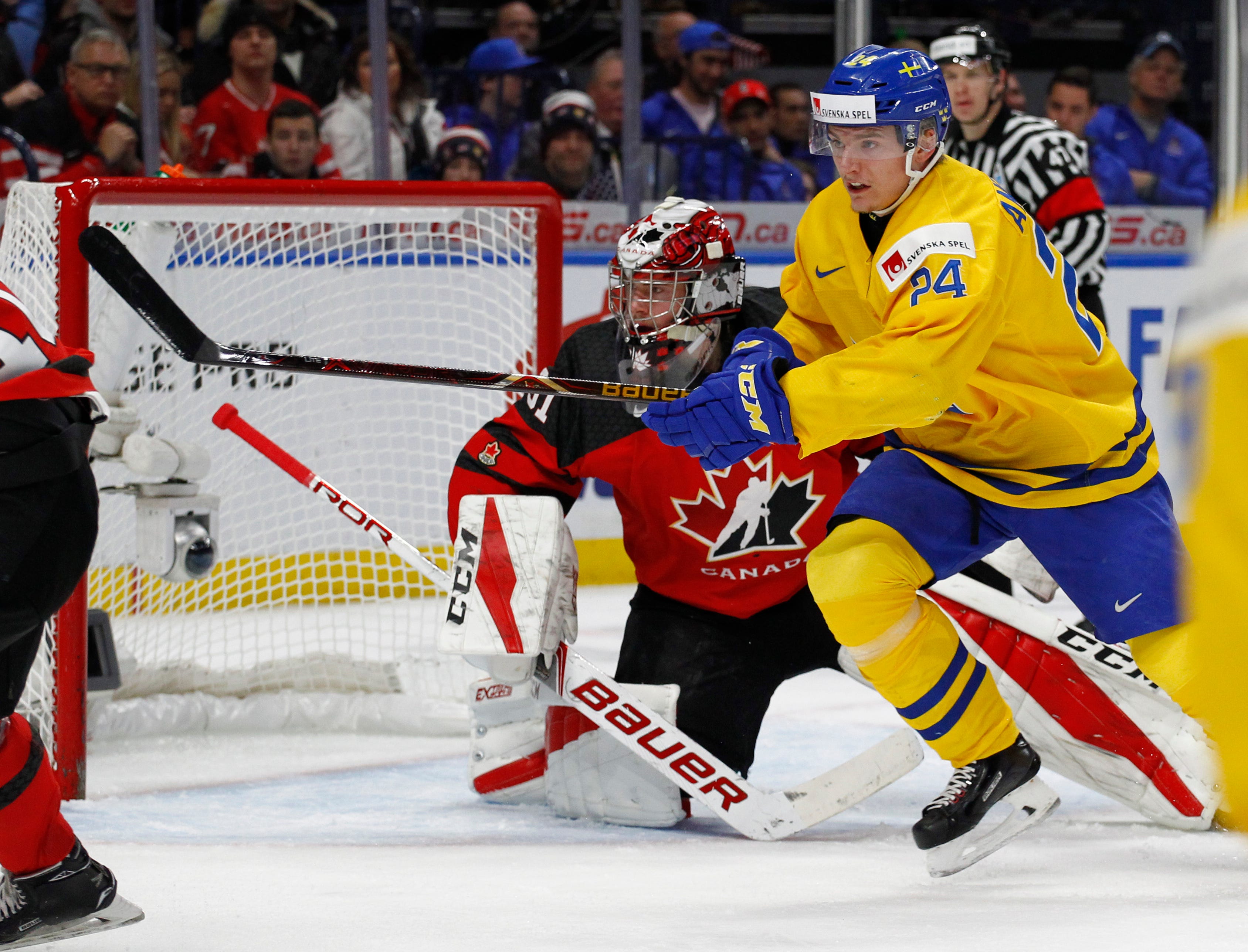 Swedish player Lias Andersson throws world juniors silver medal into stands