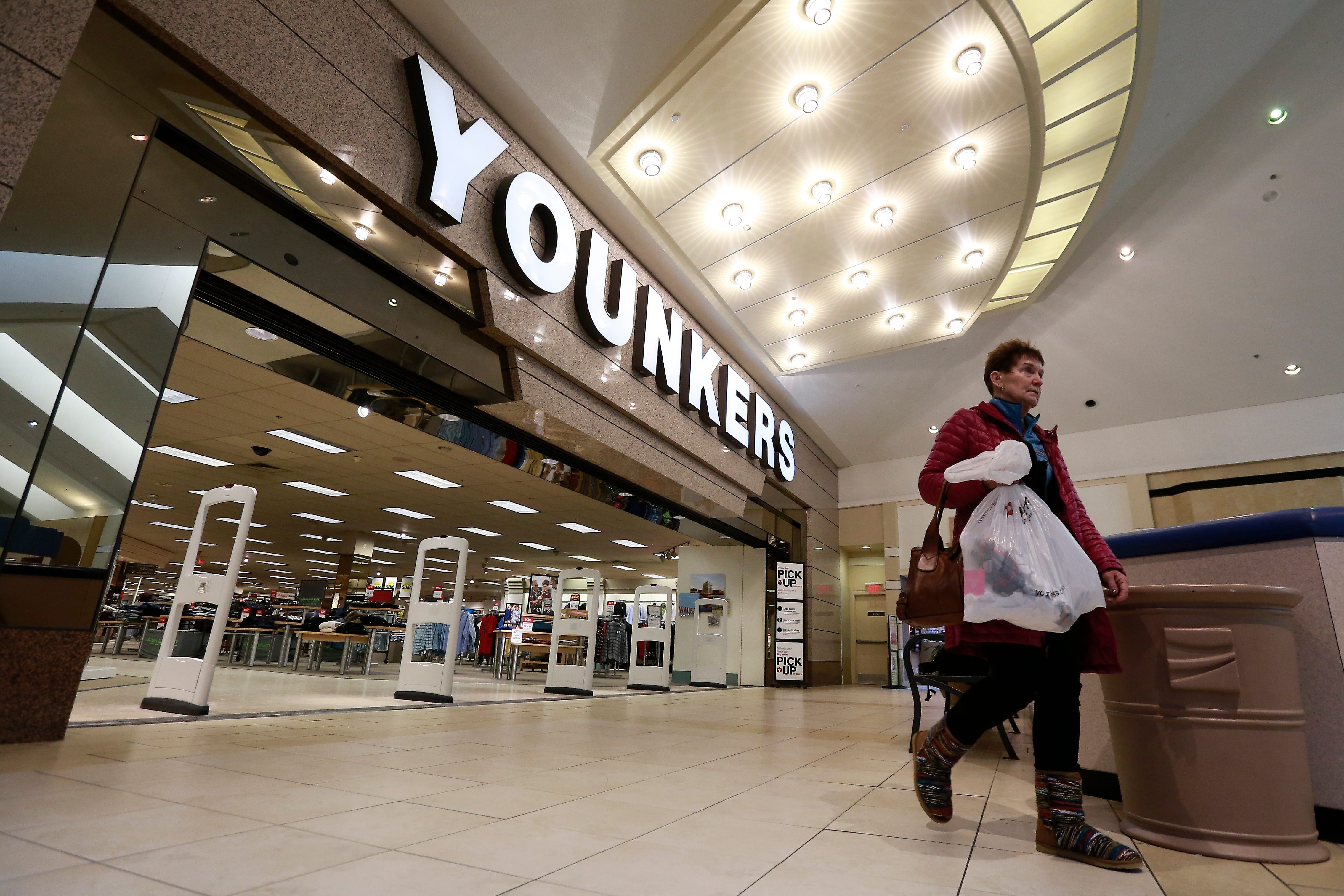 A shopper leaves Younkers store Wednesday, Jan. 31, 2018, in the Wausau Center mall in Wausau, Wis.