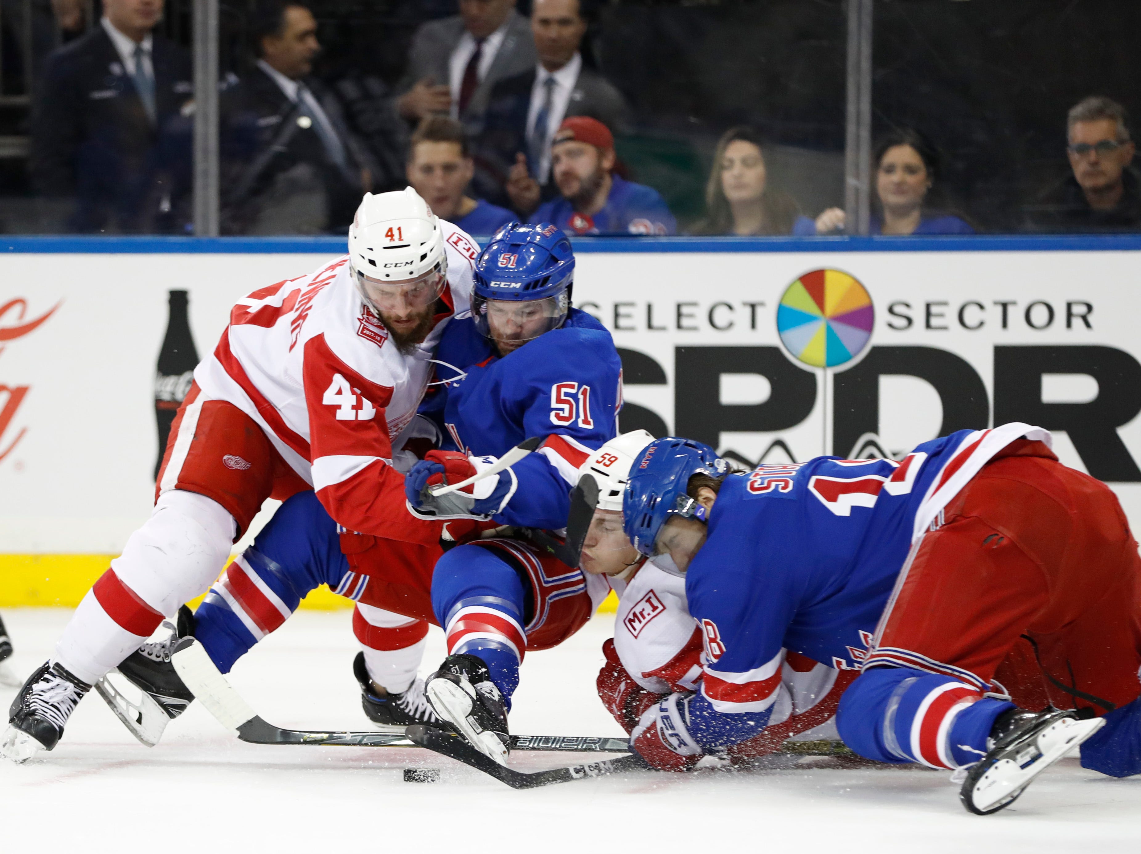 Daley scores on tip late in OT, Red Wings beat Rangers 3-2