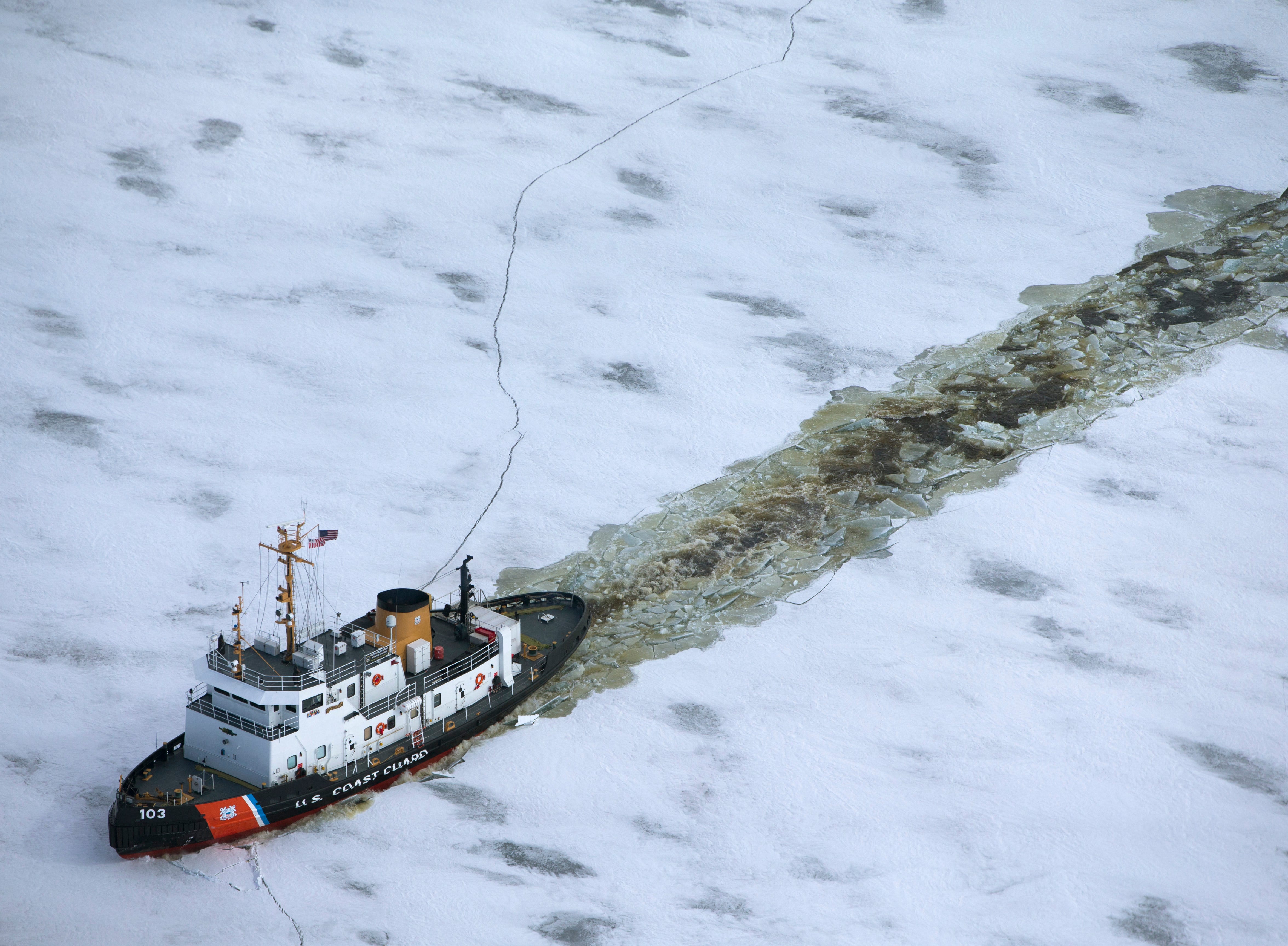 The U.S. Coast Guard cutter Mobile Bay breaks ice in Green Bay east of Marinette, Wis. According the Coast Guard spokesman Mark Gill, the average ice thickness is 24-36 inches, but they are finding spots as thick as 48-inches. It's part of the annual