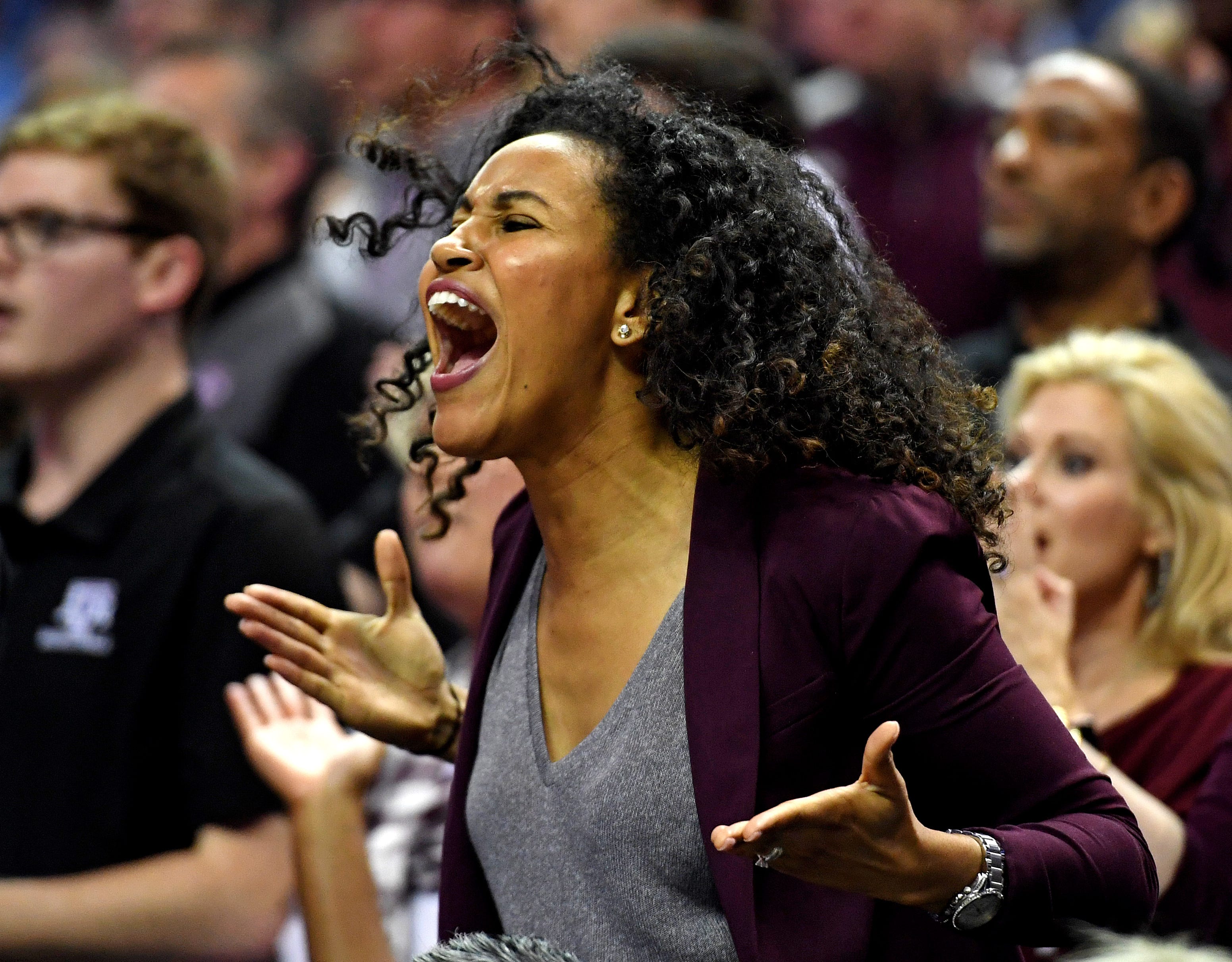 A Texas A&M Aggies fan cheers during the second half against the North Carolina Tar Heels in the second round of the 2018 NCAA Tournament at Spectrum Center in Charlotte, N.C.
