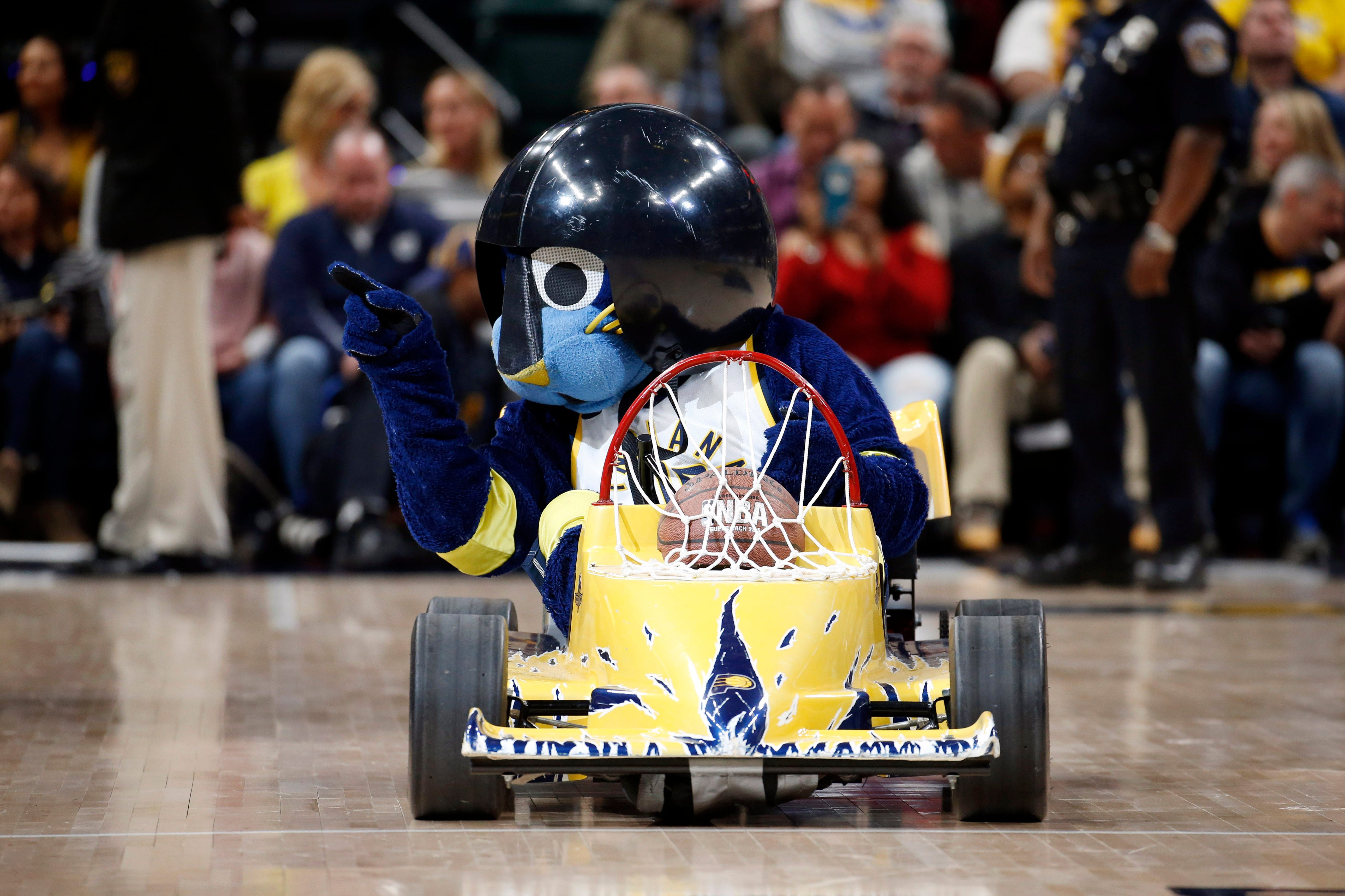 Indiana Pacers mascot Boomer drives an Indy Car go kart during a time out against the Los Angeles Lakers during the third quarter at Bankers Life Fieldhouse in Indianapolis.