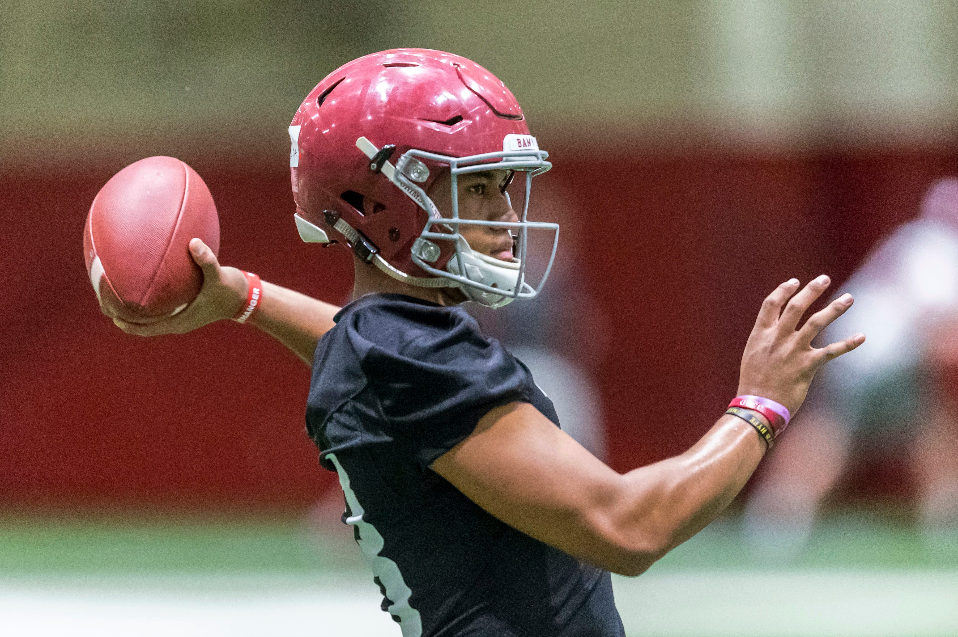 Alabama's title game star Tagovailoa out until August with re-injured left hand
