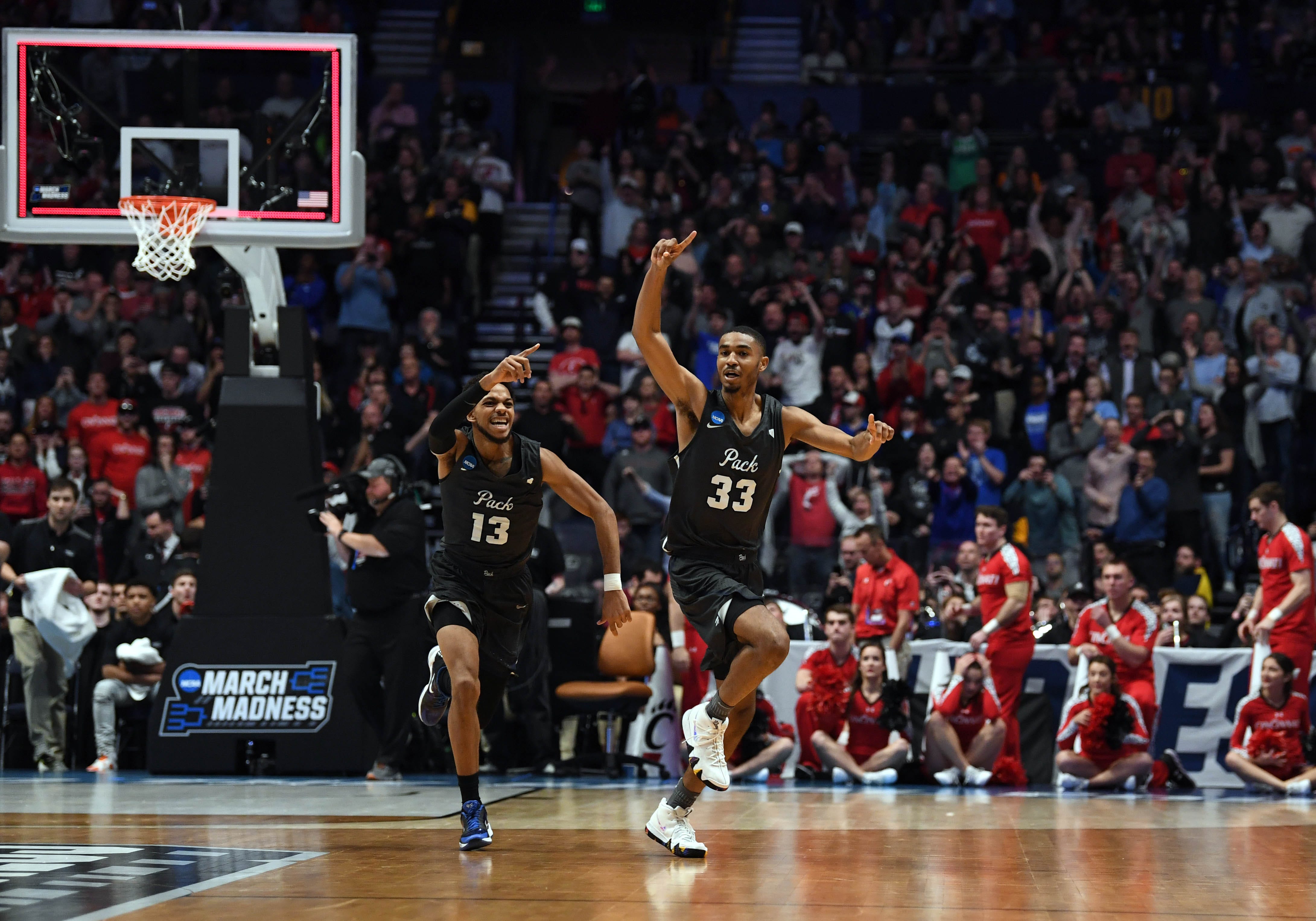 Wolf Pack guard Josh Hall reacts after defeating the Cincinnati Bearcats in the second round of the NCAA Tournament at Bridgestone Arena in Nashville, Tenn.
