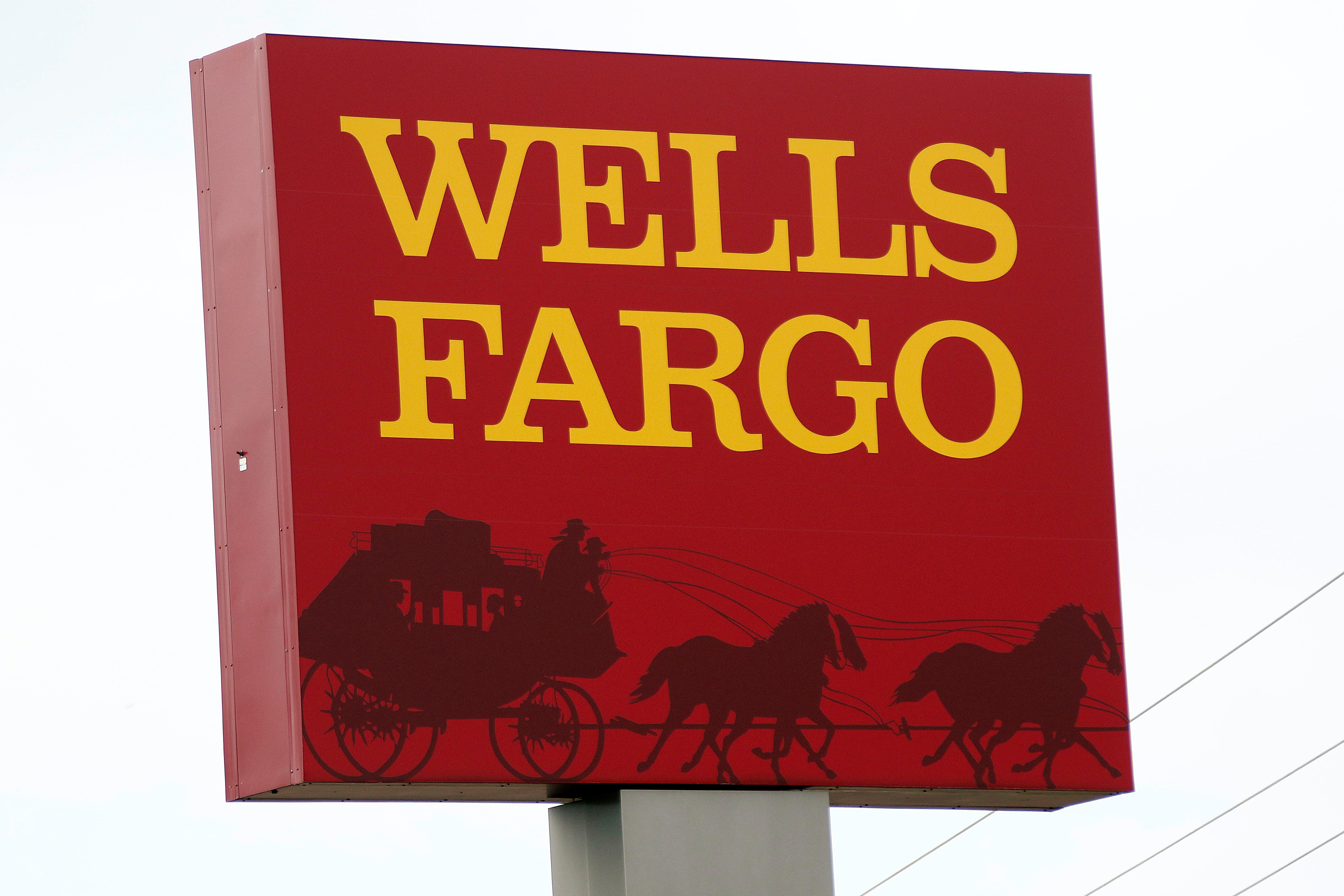 Wells Fargo fined $1 billion by regulators to settle auto-loan, mortgage abuses