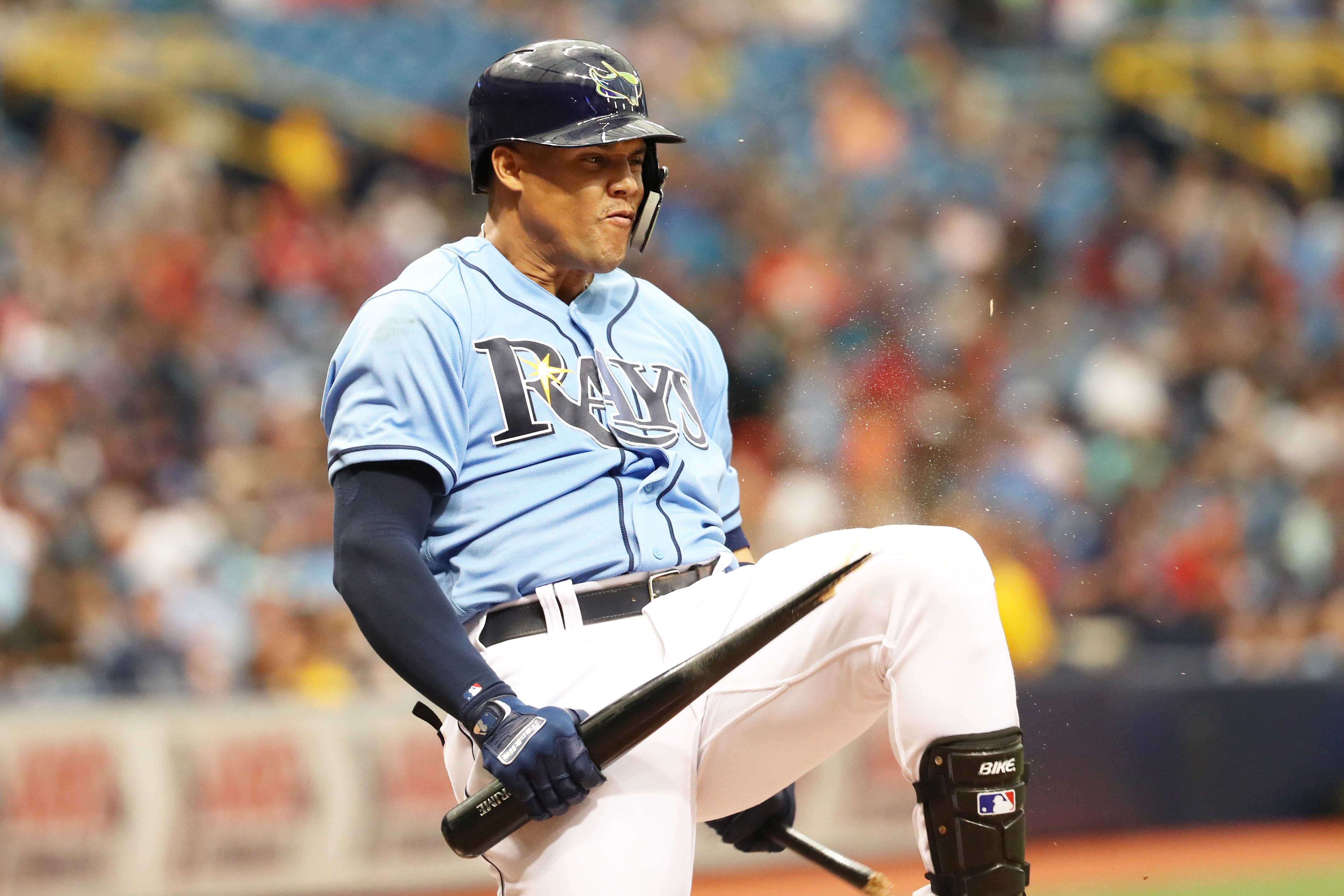 Tampa Bay Rays right fielder Carlos Gomez breaks his bat over his knee after stricking out during the fifth inning against the Minnesota Twins at Tropicana Field in St. Petersburg, Fla.