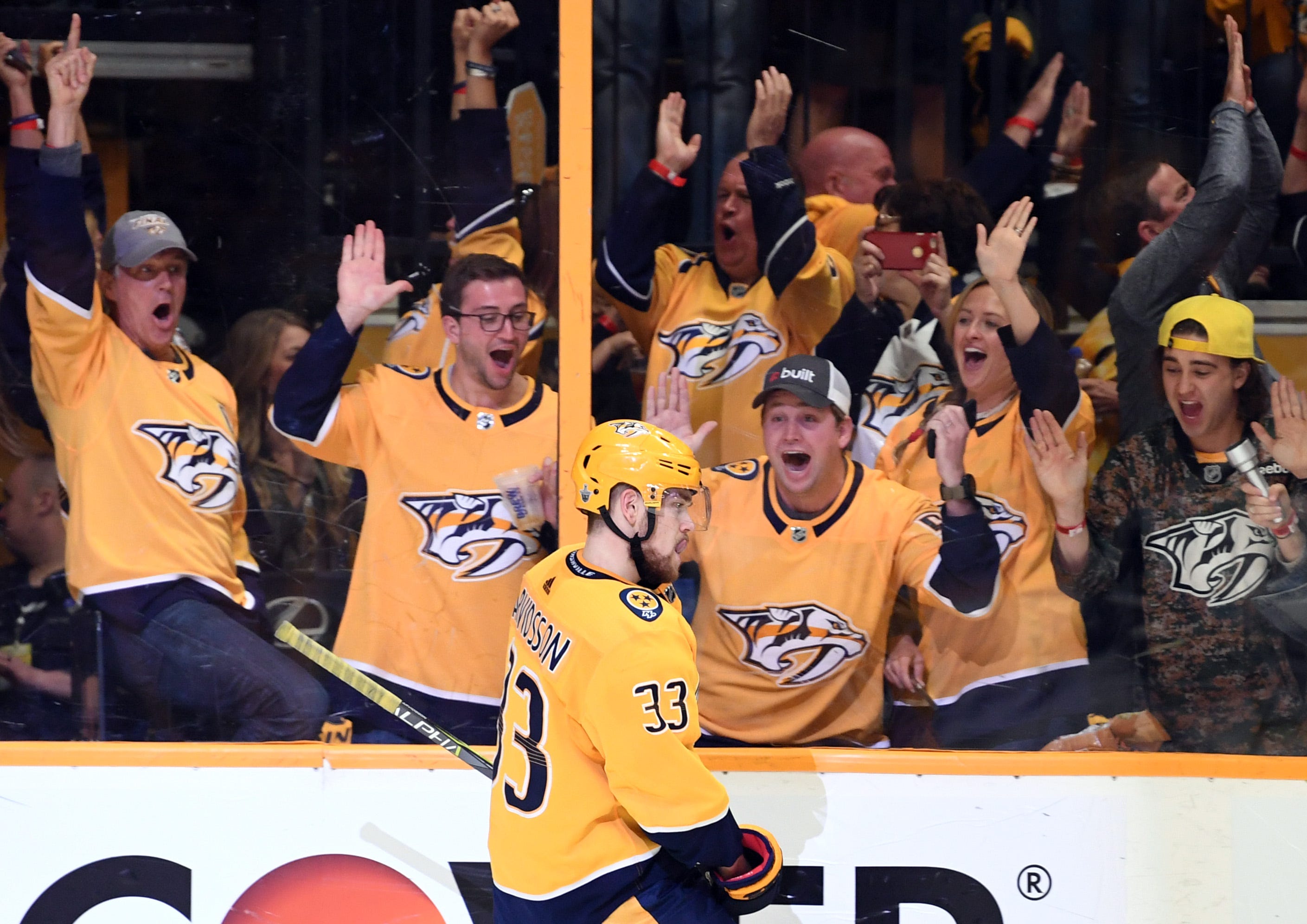 Nashville Predators fans celebrate after a goal by left wing Viktor Arvidsson during the second period  in game two of the second round of the 2018 Stanley Cup Playoffs at Bridgestone Arena.