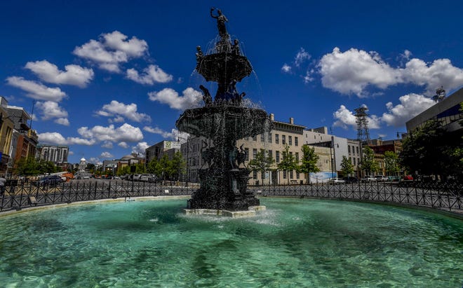 The Court Square Fountain and the Alabama State Capitol Building on Dexter Avenue in Montgomery on July 6, 2017. While more than a quarter-million people call Montgomery home, it has somehow managed to maintain a tight-knit feel.