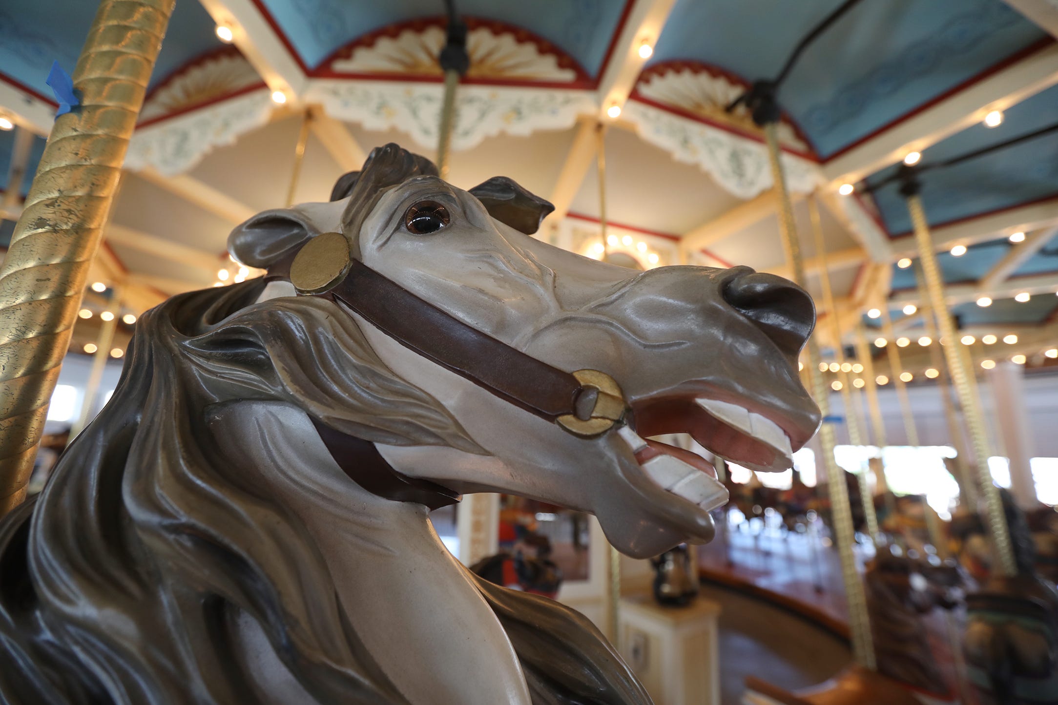 One of the handcarved horses on the carousel at Seabreeze.
