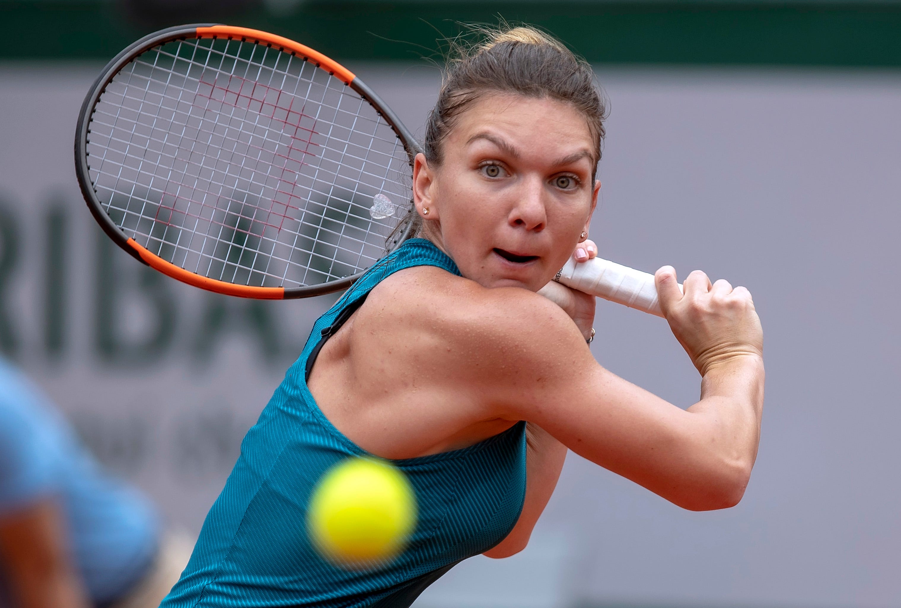 Simona Halep (ROU) in action during her match against Alison Riske (USA) on day four of the 2018 French Open in Paris.