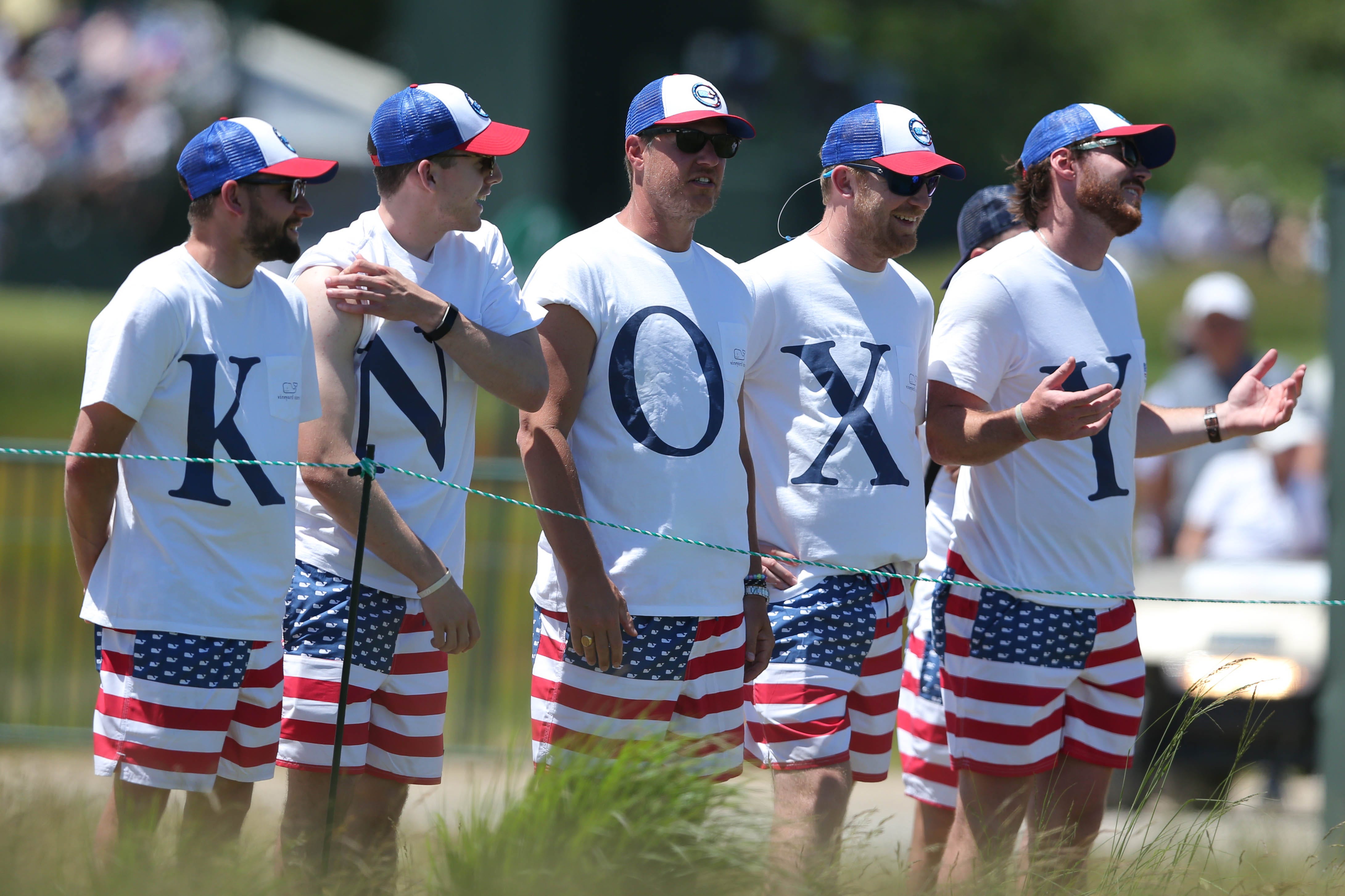 Fans of Russell Knox wear coordinated outfits during the first round of the U.S. Open golf tournament at Shinnecock Hills GC.