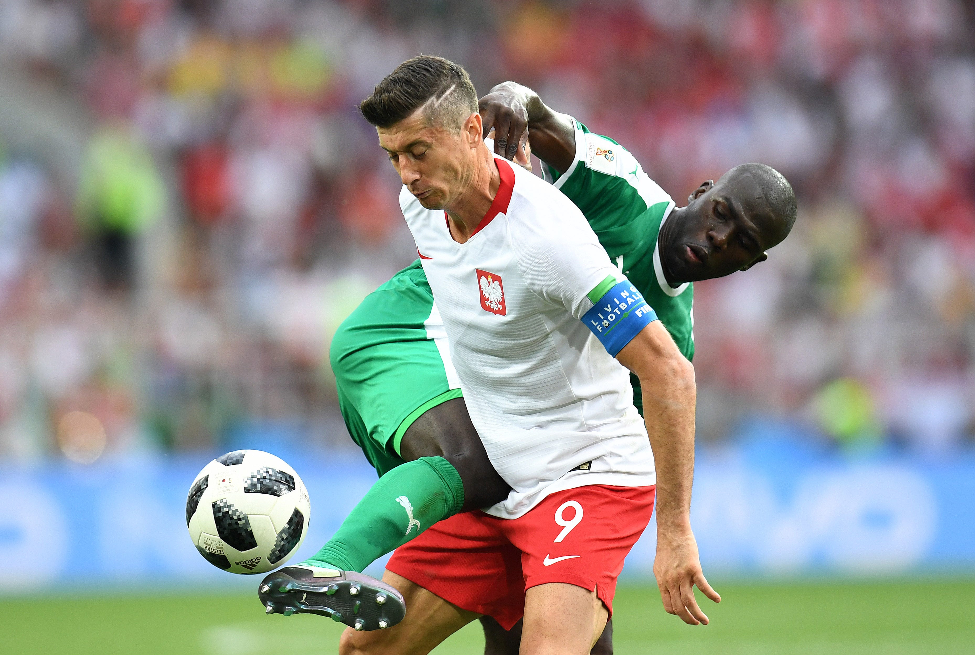 Polish forward Robert Lewandowski battles for the ball with Senegal defender Kalidou Koulibaly in Group H play during the FIFA World Cup 2018 at Spartak Stadium in Moscow.
