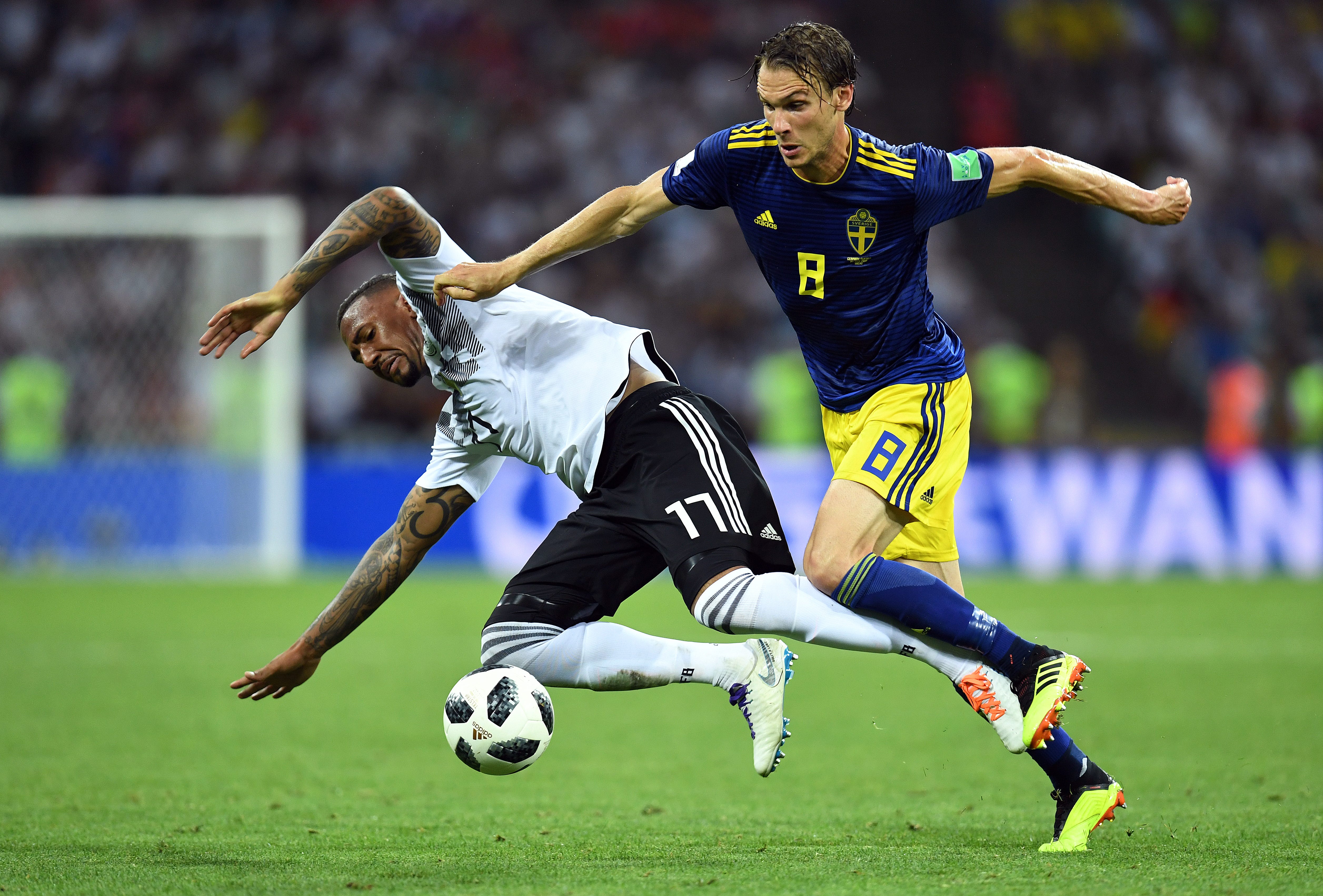 Germany defender Jerome Boateng, left, plays for the ball against Sweden midfielder Albin Ekdal in Group F play during the FIFA World Cup 2018 at Fisht Stadium in Sochi, Russia.