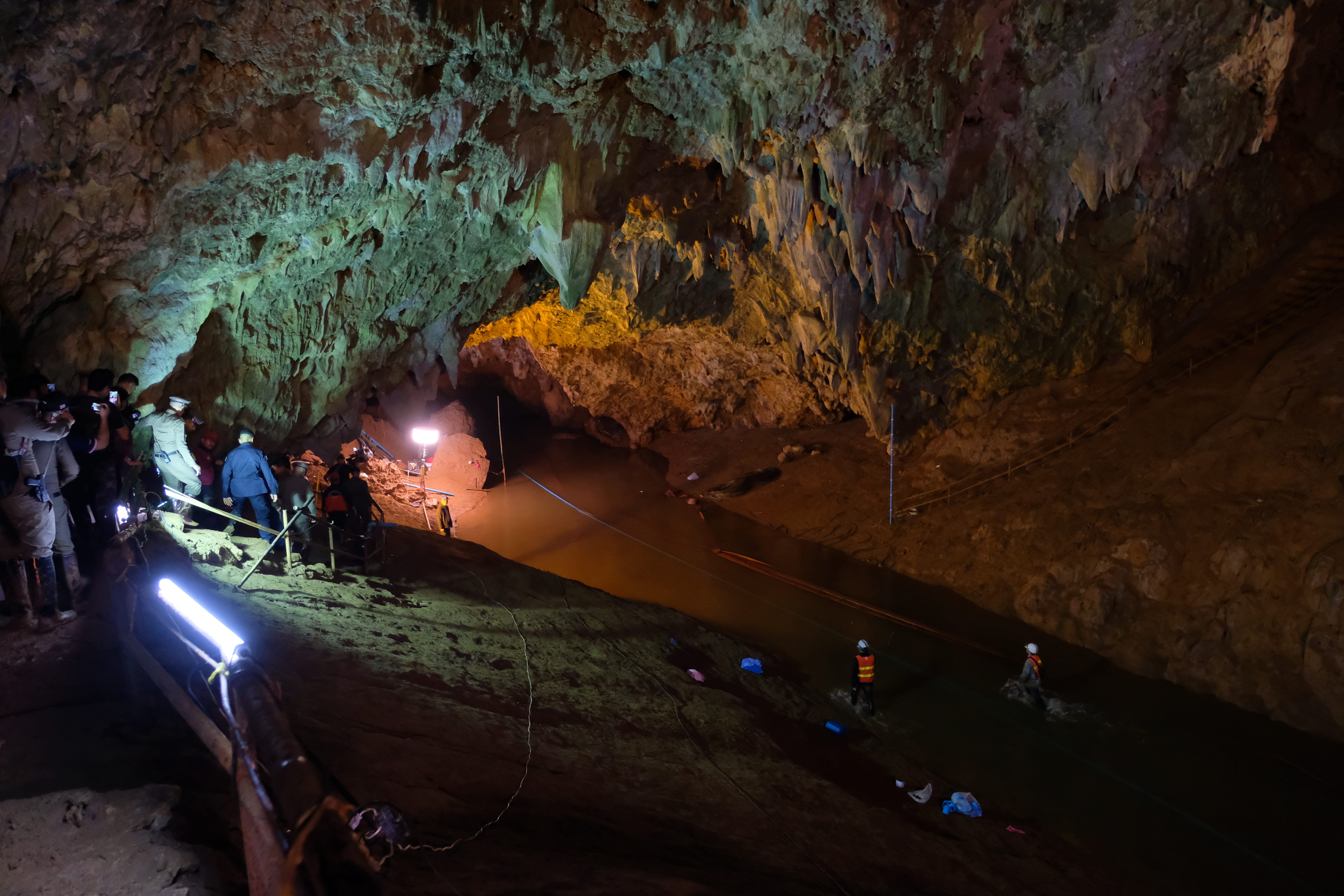Thai officers supervise the rescue mission inside Tham Luang Nang Non cave on in Chiang Rai, Thailand. Rescuers battle heavy rain in northern Thailand as they continued the search for 12 boys and their soccer coach who have been missing in Tham Luang