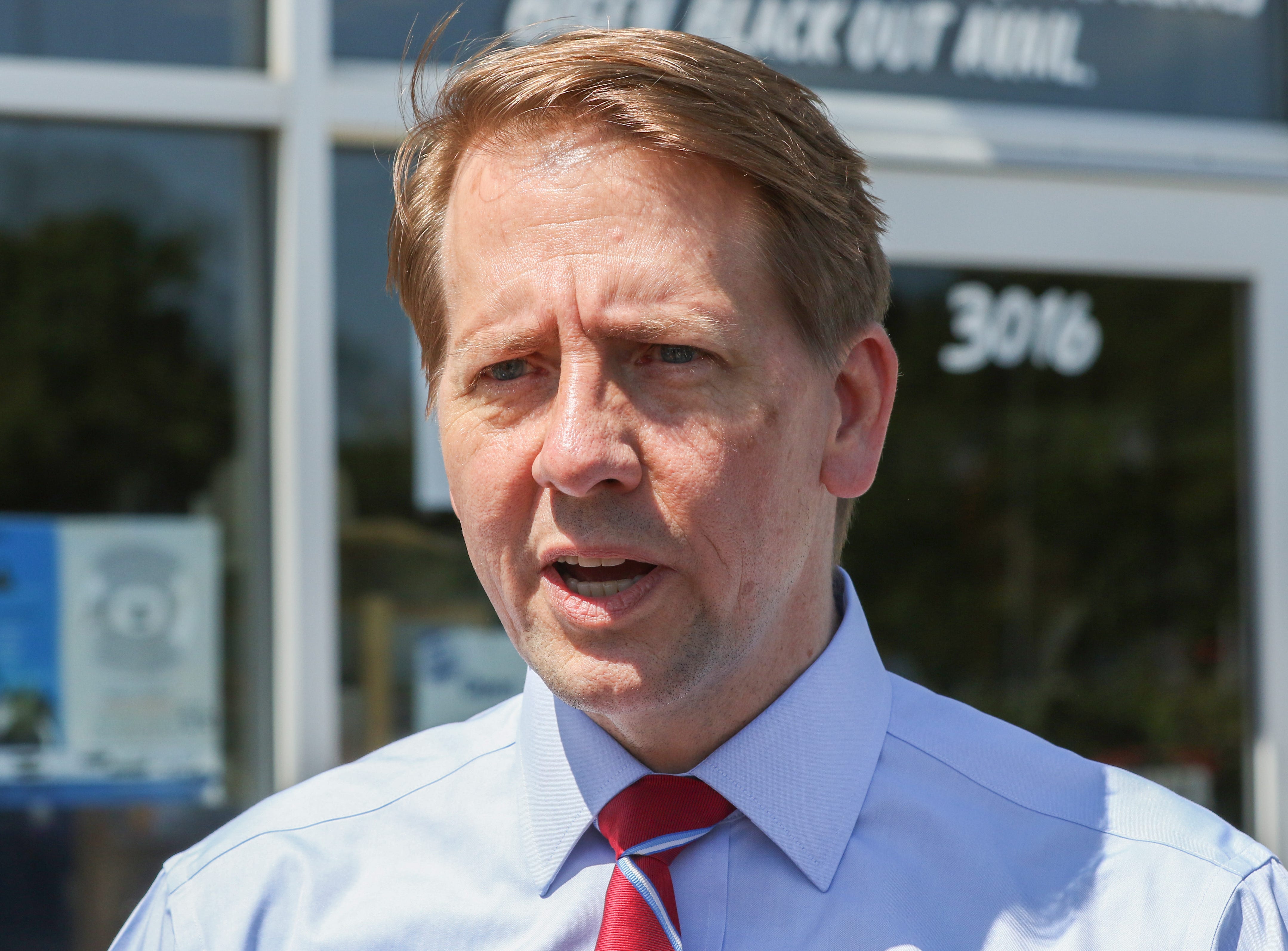 Firm worked for Cordray's agency, then campaign