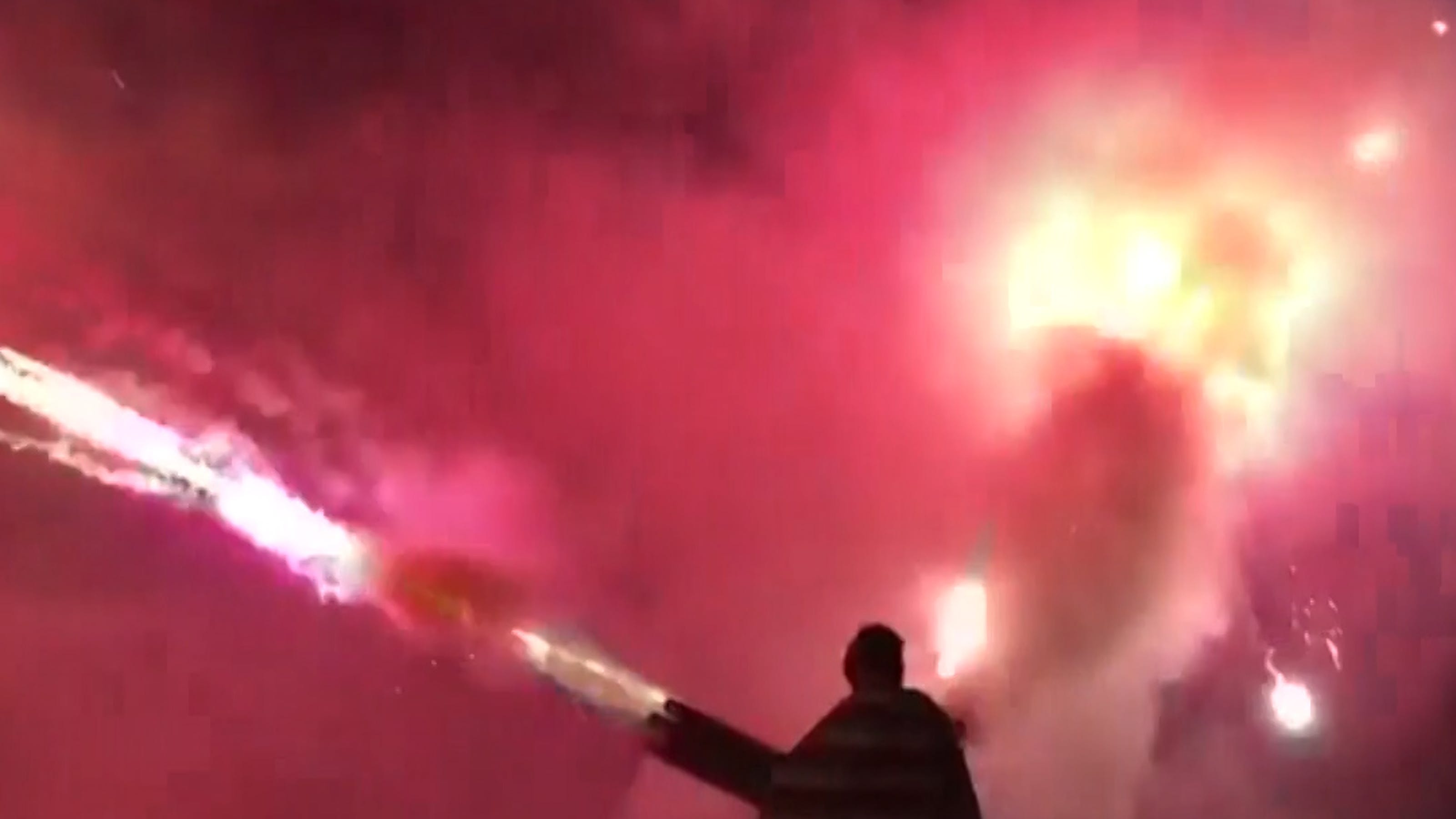 Man straps firework-shooting cannons to himself