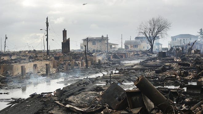 The 2018 extreme weather season continues to unfold. A city is shown in the aftermath of a hurricane.
