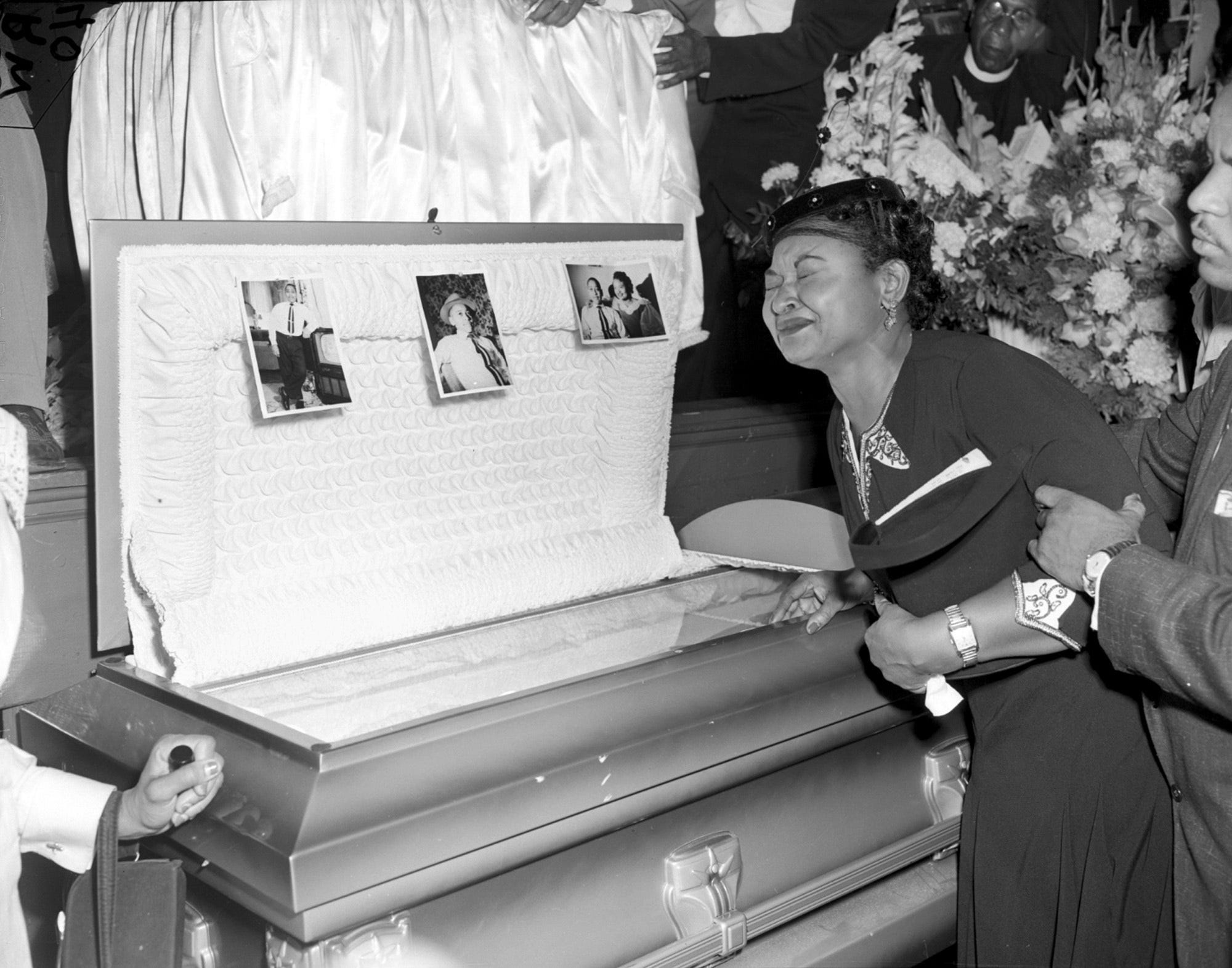 Mamie Till Mobley, mother of Emmett Till, weeps at her son's funeral in Chicago in 1955.