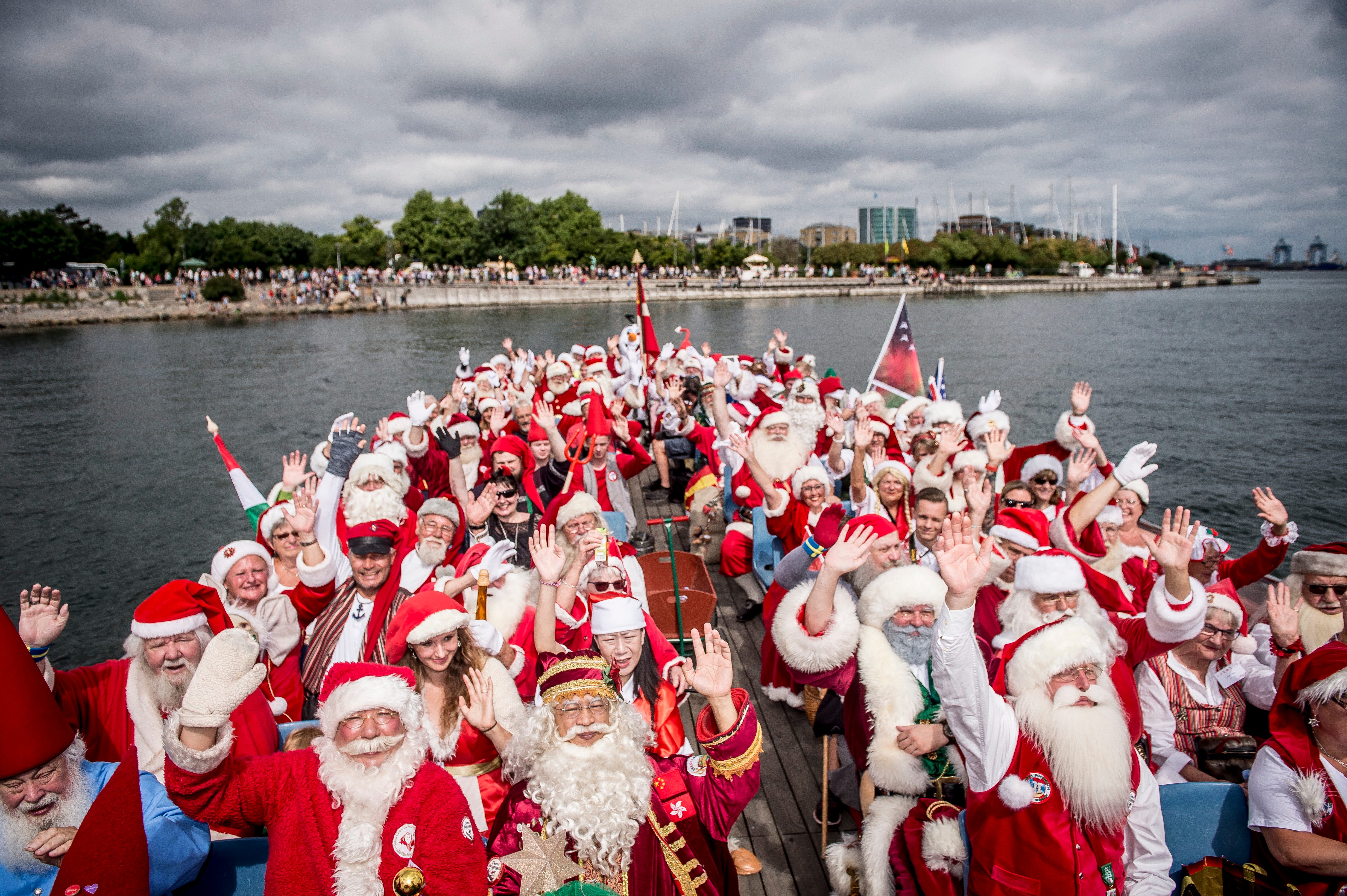 Participants wearing costumes attend the World Santa Claus Congress in Copenhagen, Denmark. The congress is an annual event held every summer in the Danish capital. Around 130 Santas, santas wives and elves meet to celebrate Christmas in July.
