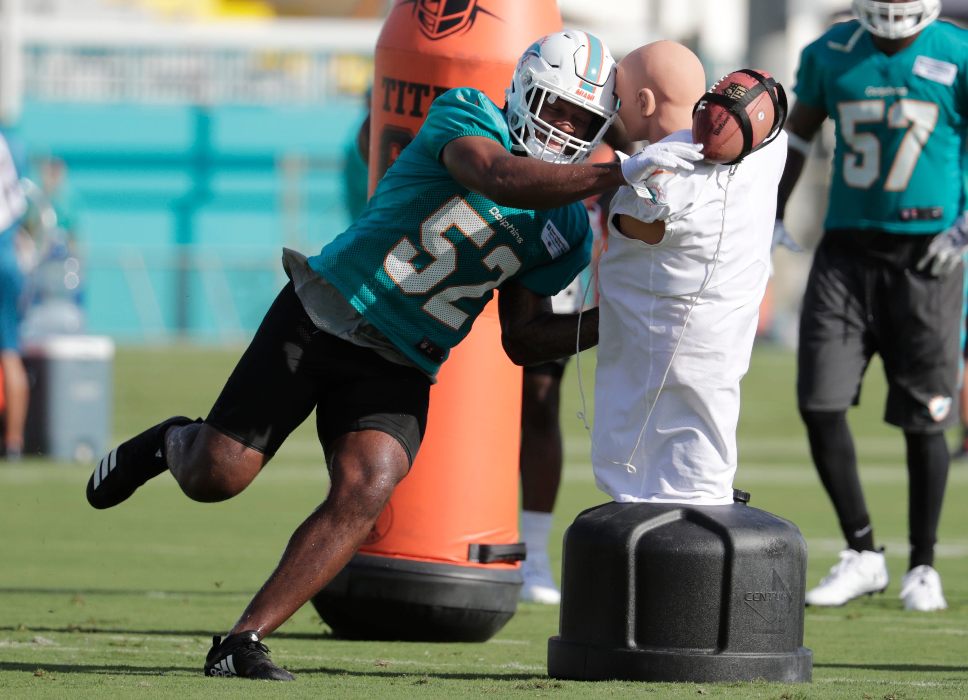 Back from knee injury, Dolphins' McMillan ready for contact