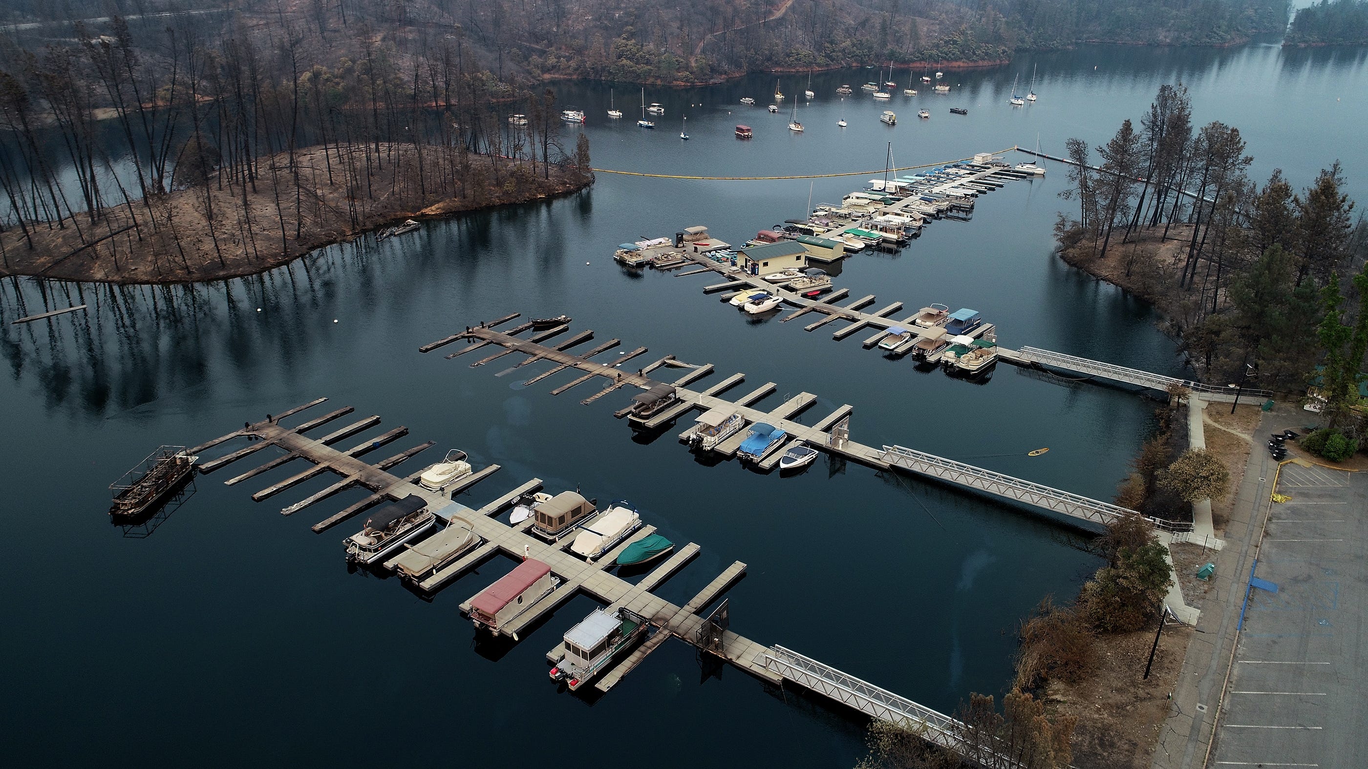 Damage from the Carr Fire is seen at Oak Bottom Marina in Whiskeytown, Calif. Aug. 1, 2018. Several boats were affected by the fire when it rolled through the area late last week.