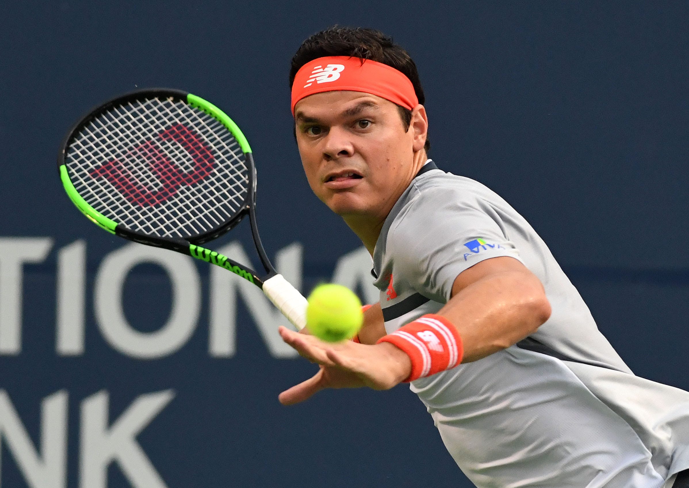 Milos Raonic, of Canada, plays a shot against David Goffin, of Belgium, in the Rogers Cup tennis tournament at Aviva Centre in Toronto.