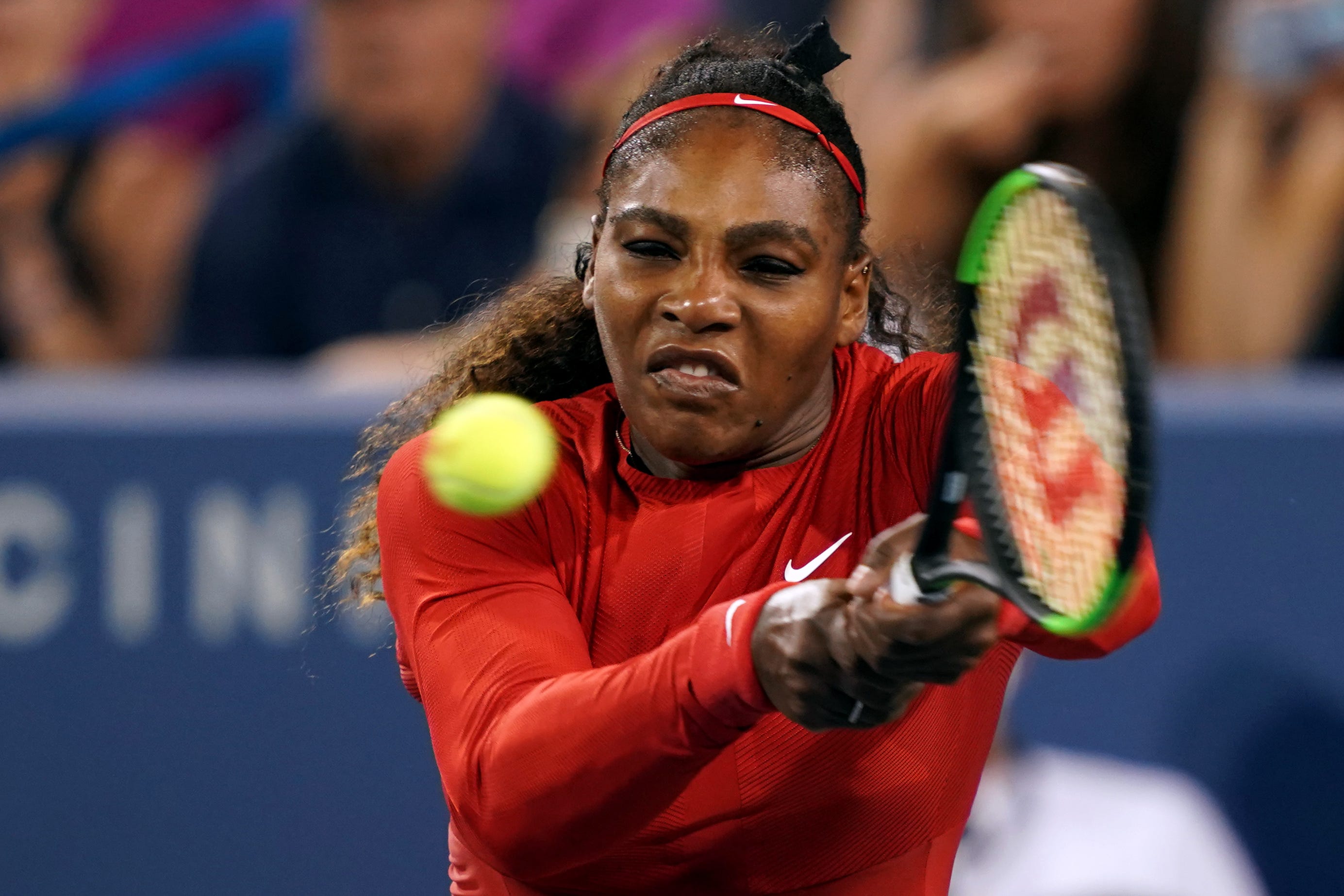 Serena Williams returns a shot against Petra Kvitova in the Western and Southern tennis open at Lindner Family Tennis Center in Mason, Ohio.